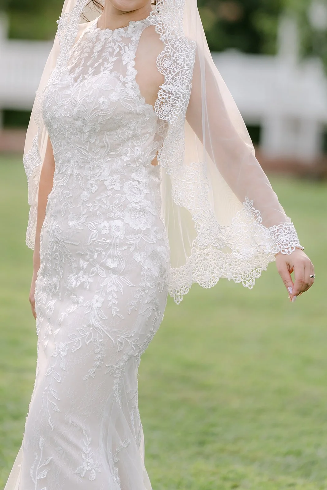 Close-up of the beaded lace on Elaine's gown, photographed by One and Only Production.