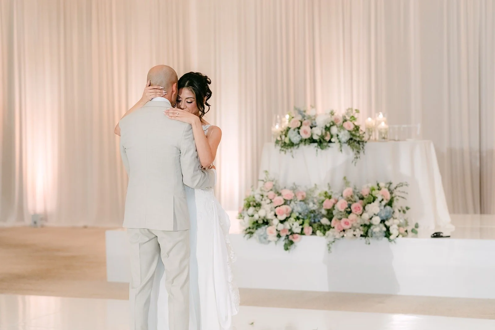 Francesca and Daniel hold each other close during their first dance