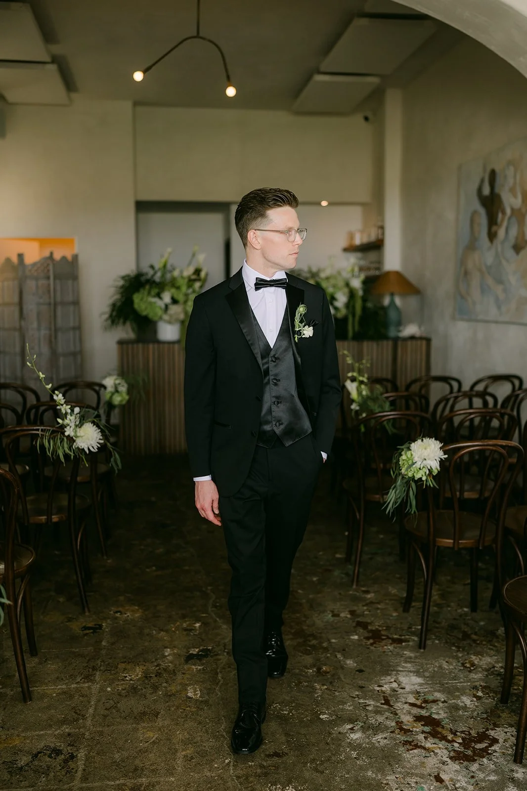 Matthew walking through the ceremony room