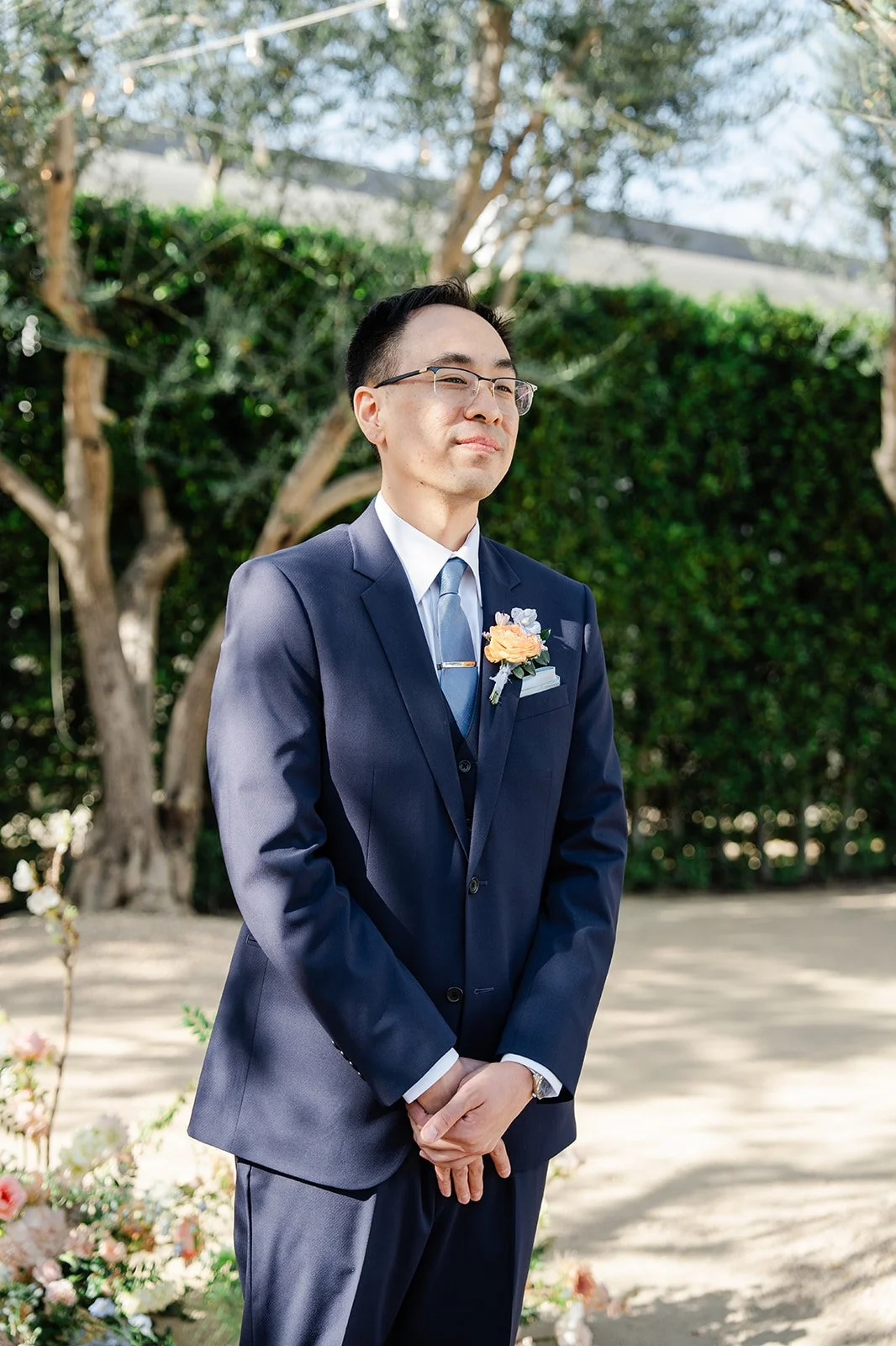 Lawrence smiling as Constance comes down the aisle