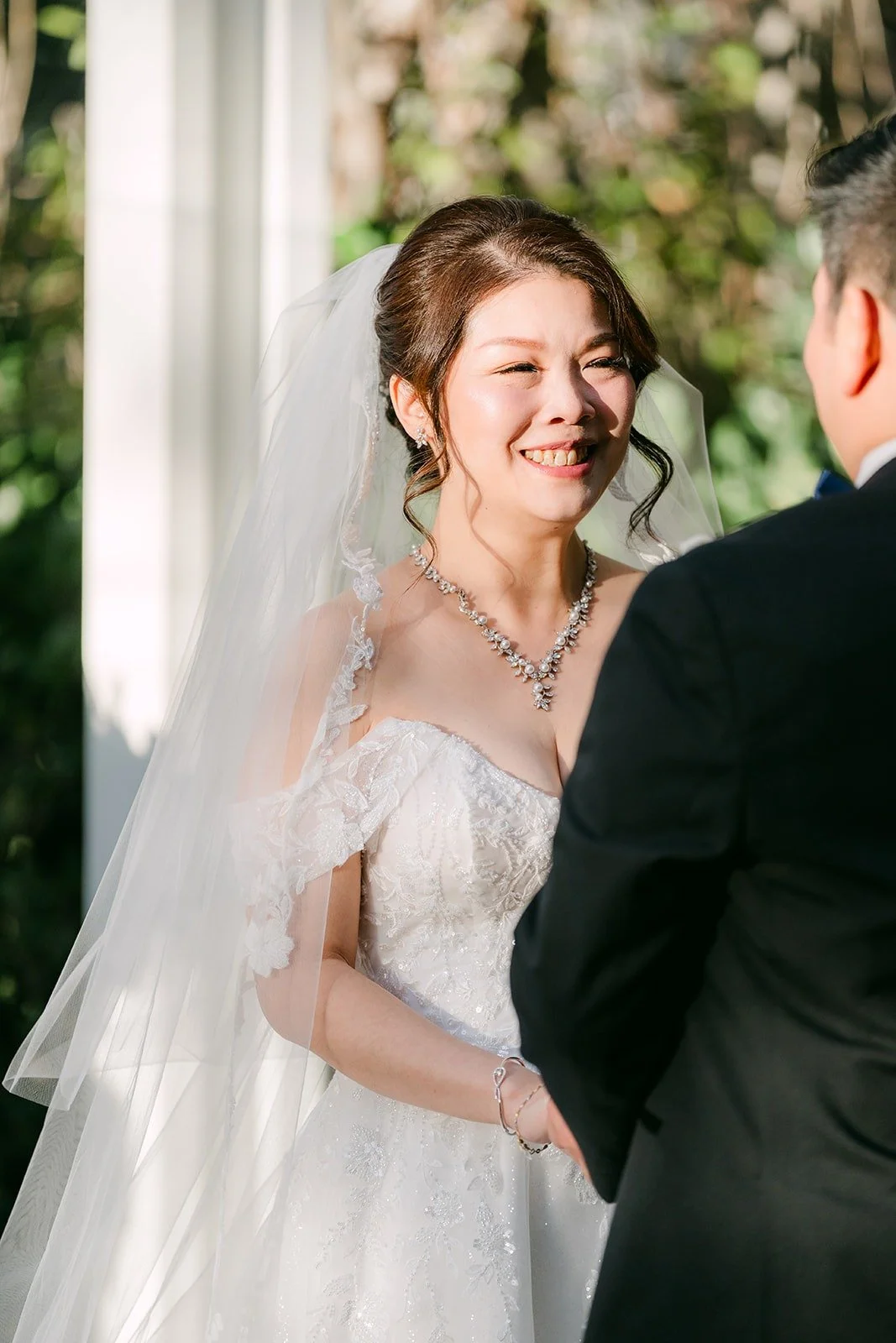 Sochi smiles at Jay during the vows