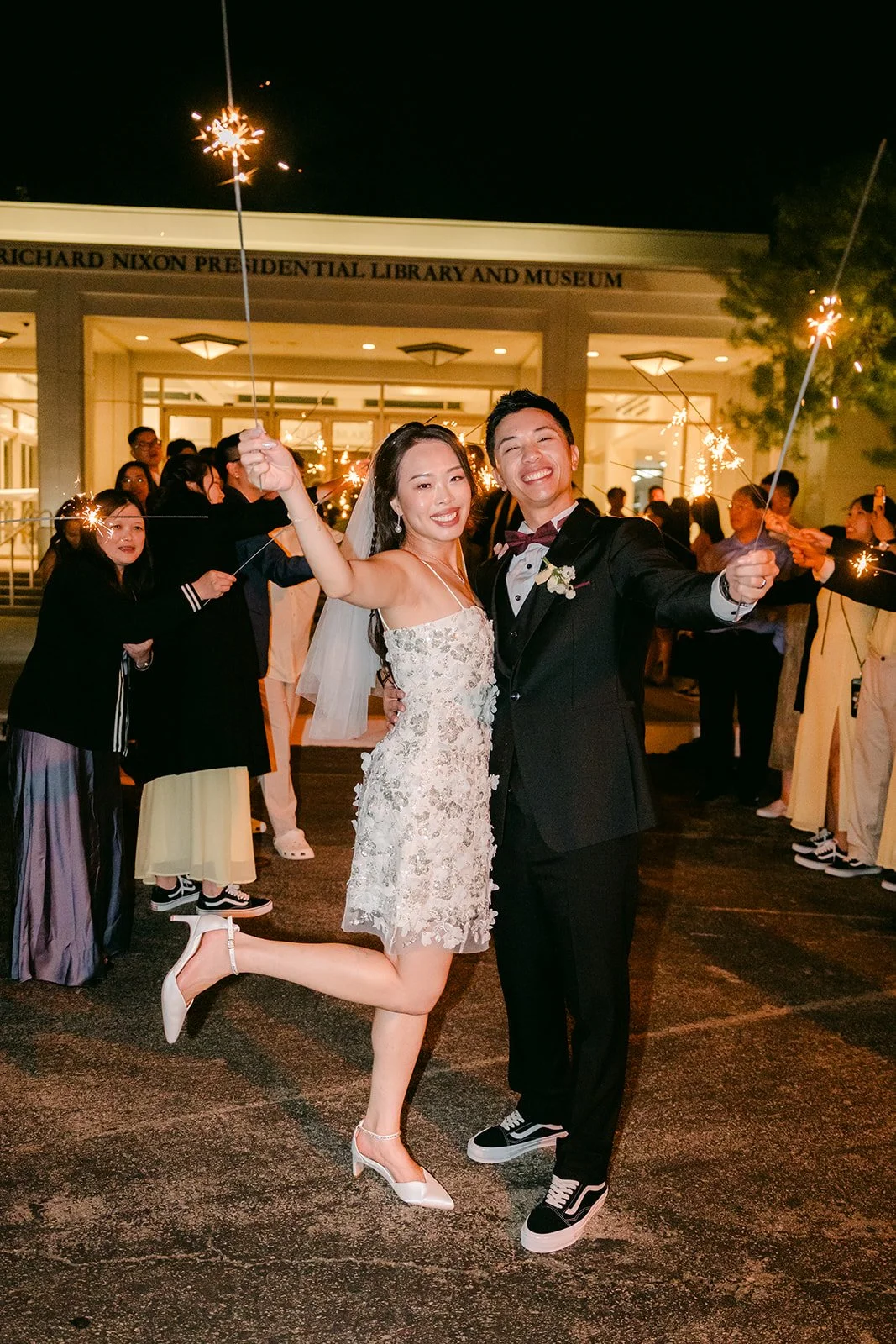 Jenny kicking up her heel beside Ryan during the grand exit.