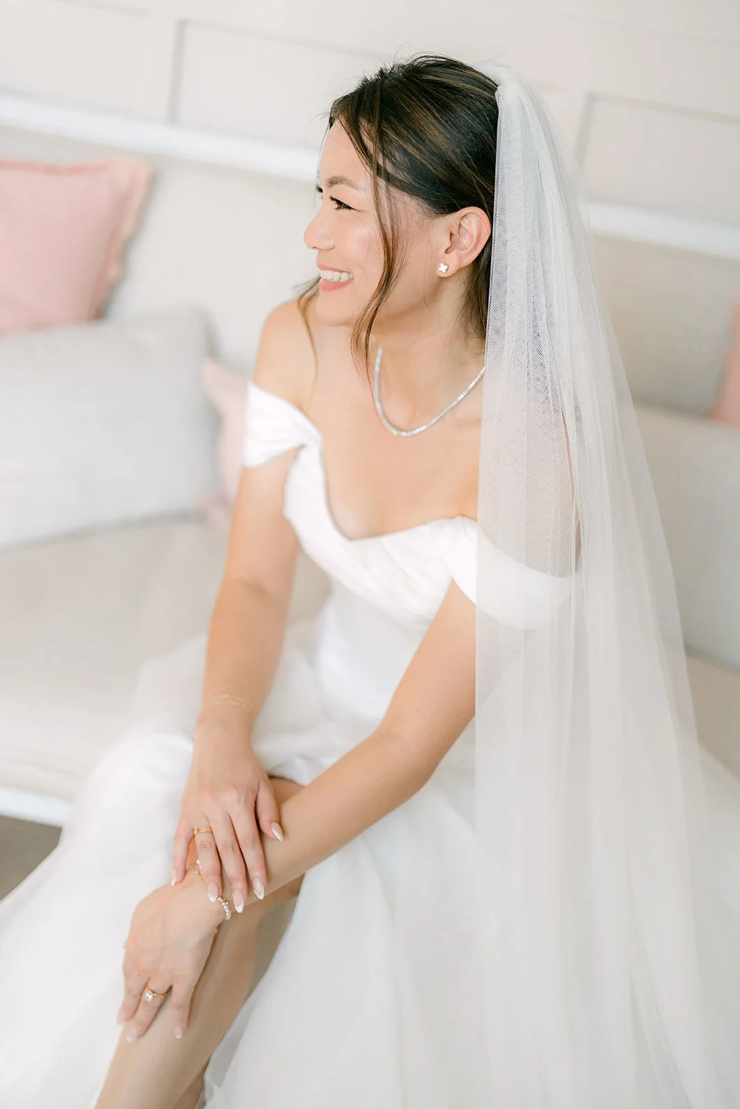 Jadee seated with her cathedral veil
