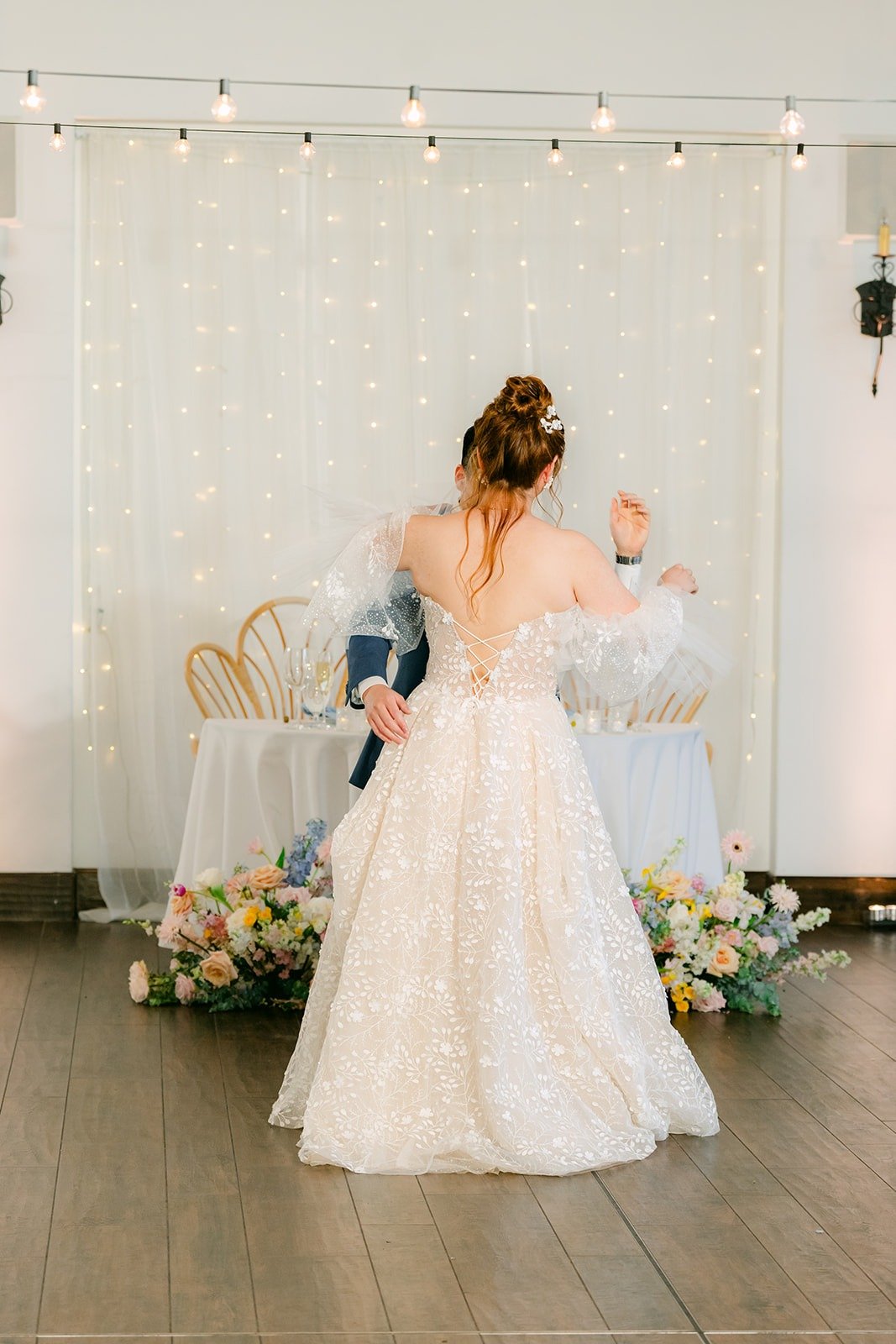 Joanna spinning in her gown during the first dance