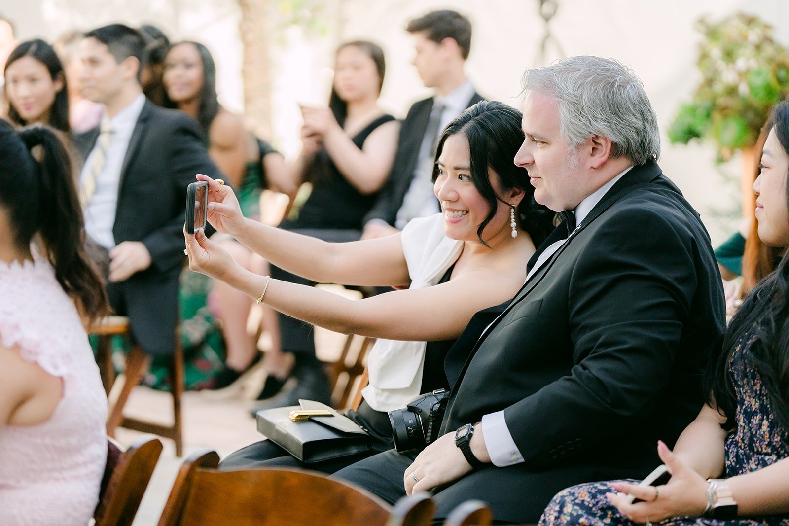 Guests snapping photos from their table