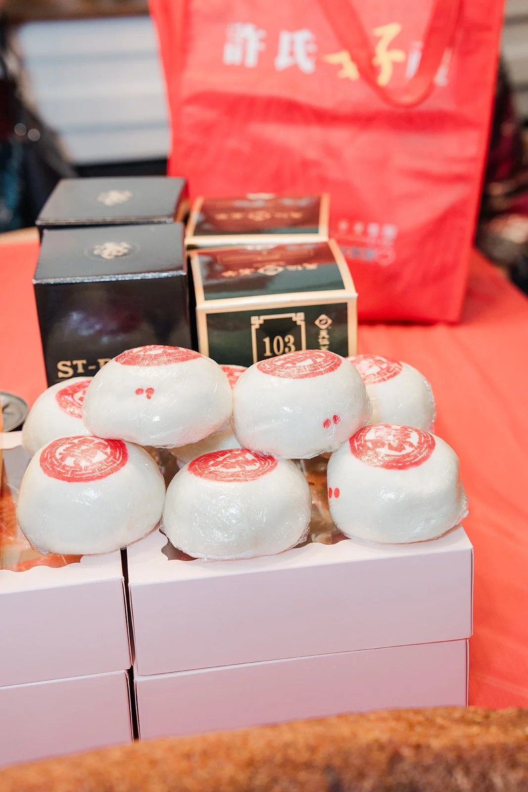 Gift boxes and buns stacked for the family, photographed by One and Only Production.