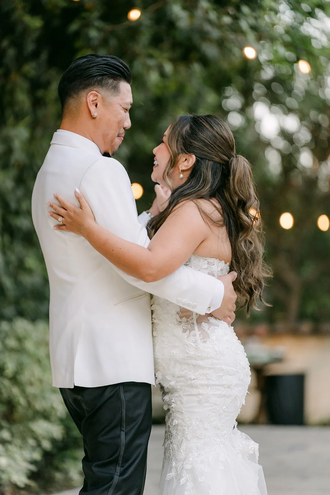 Nicole and Caryl holding each other close during their first dance.