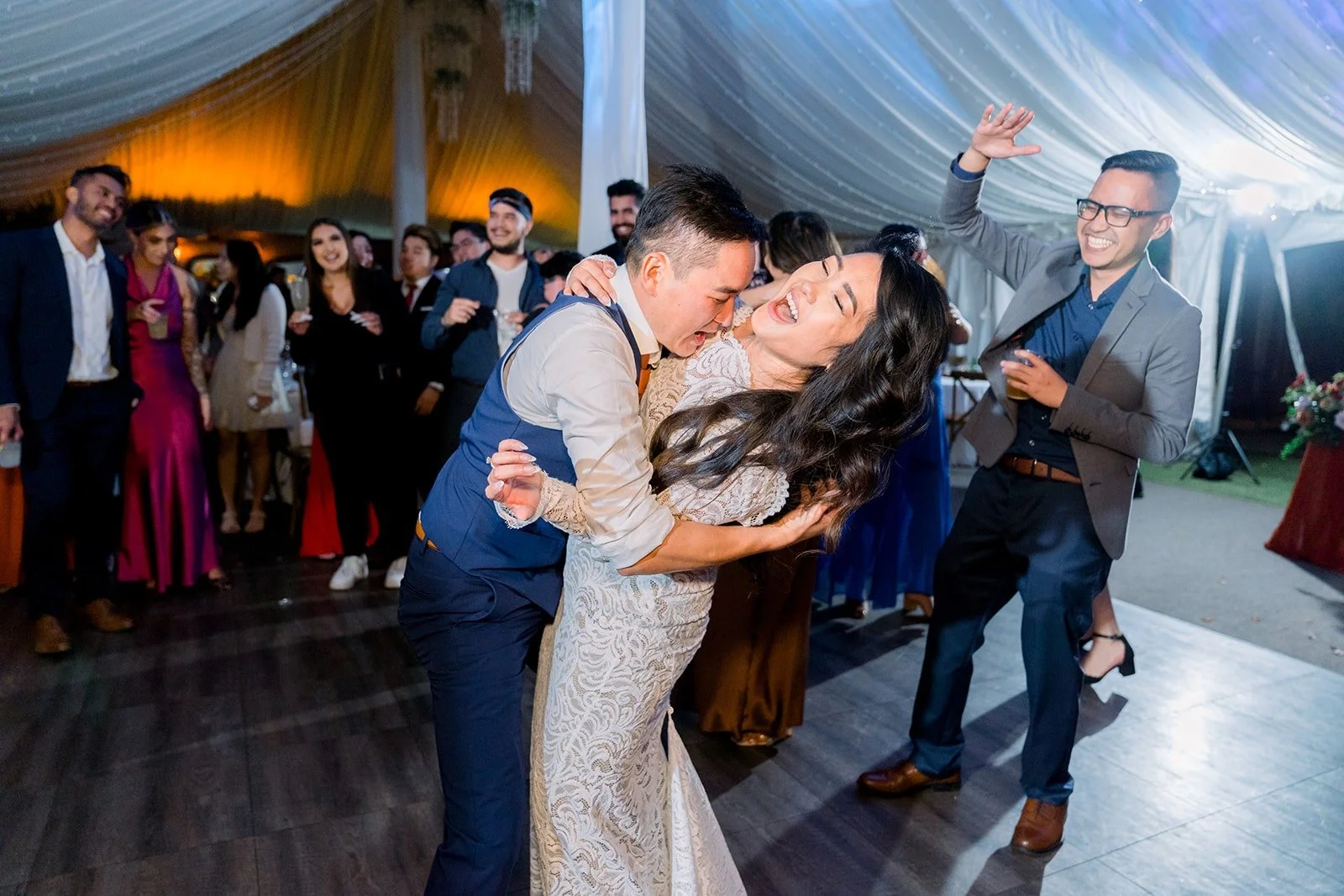 Hannah and Vincent dancing with their friends