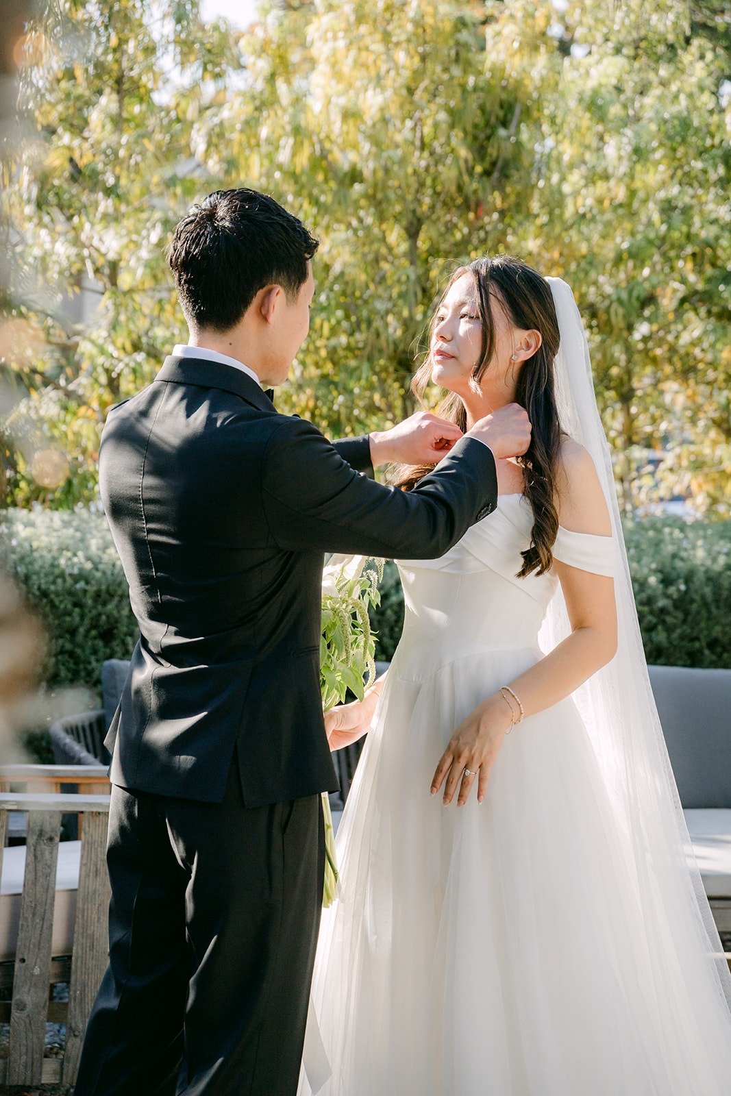 Richard touching Jadee's face during their first look