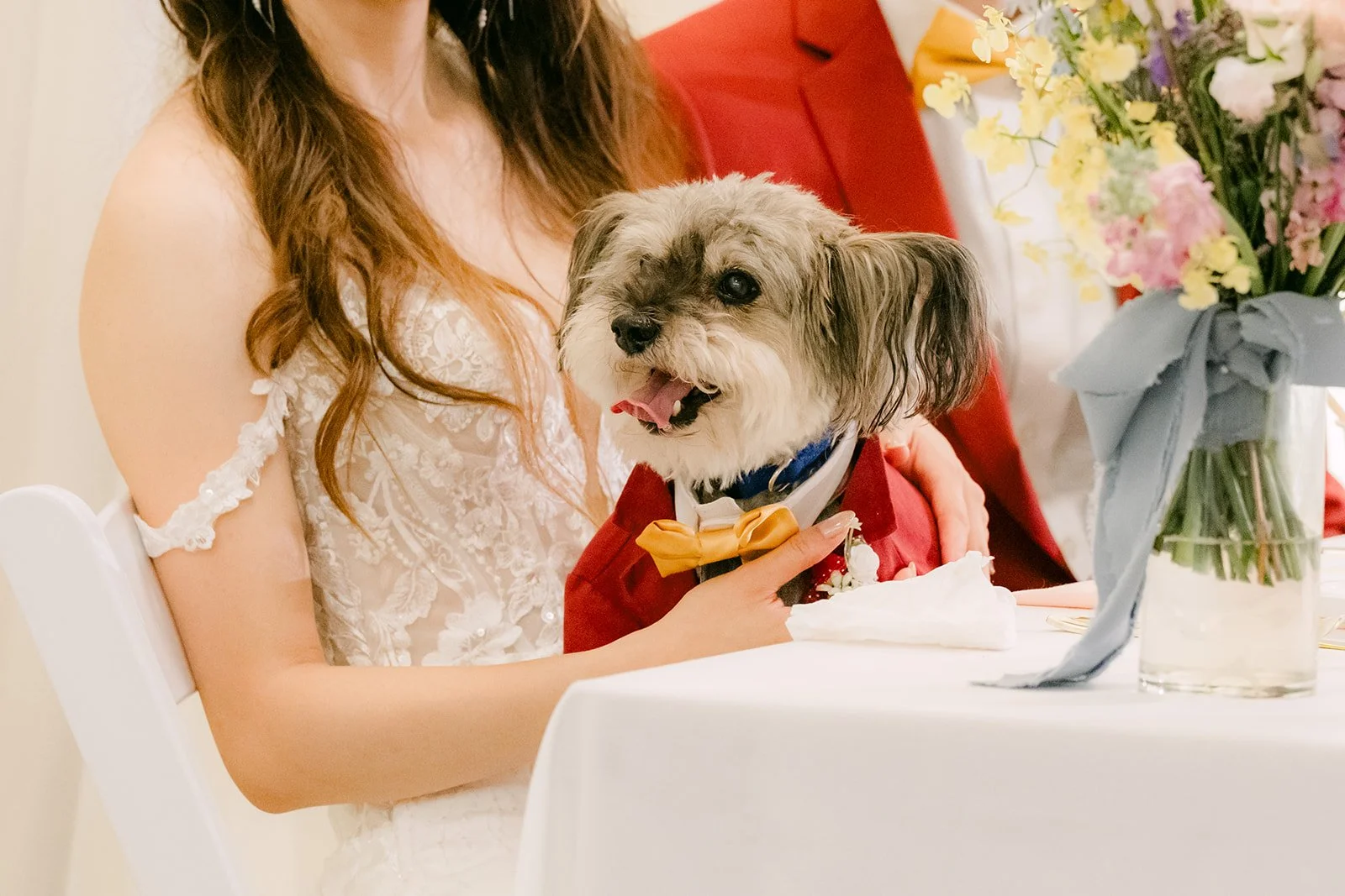 Izzo resting next to Christie at the sweetheart table.