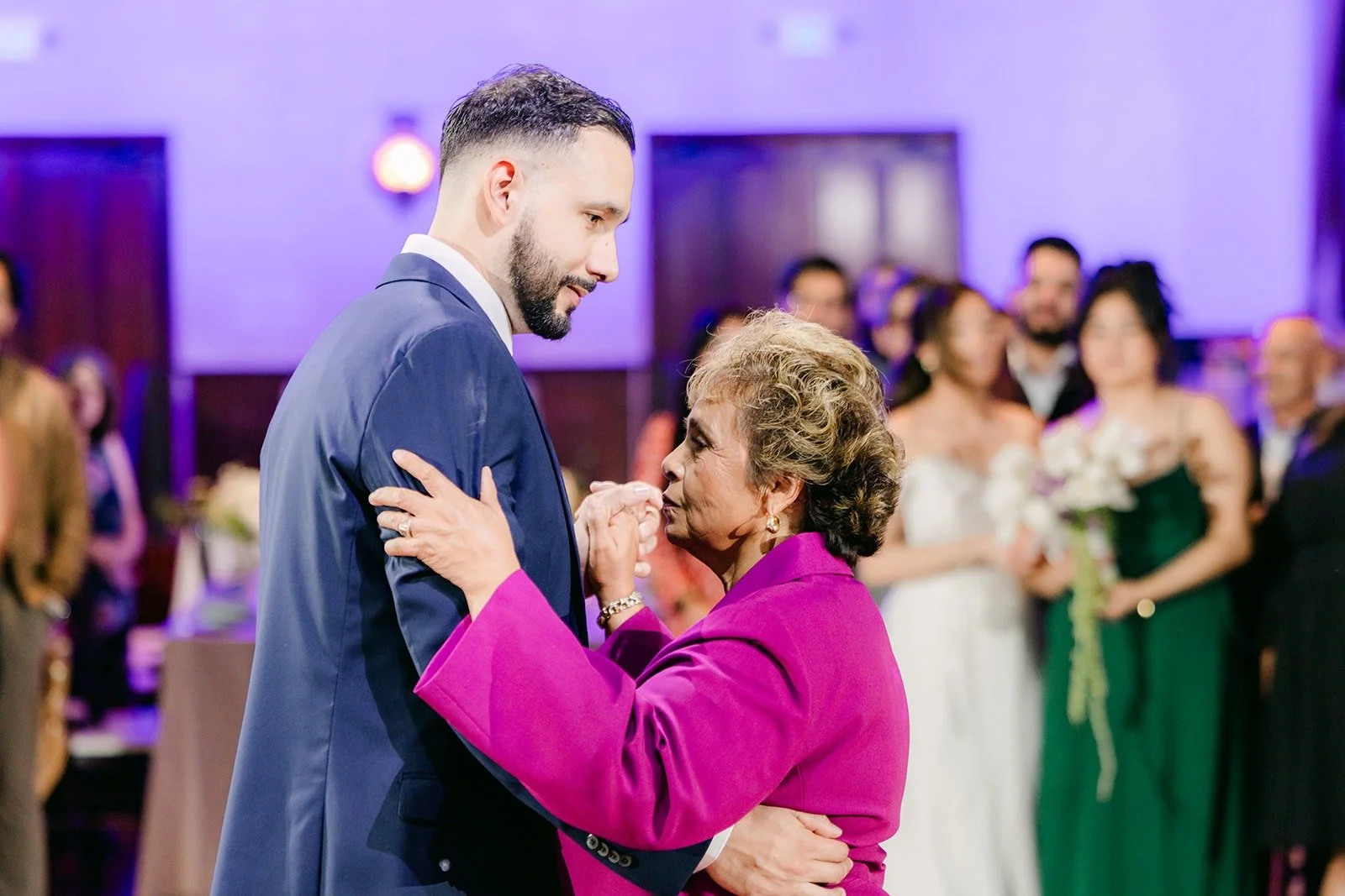 Danny sharing his parent dance with a family member