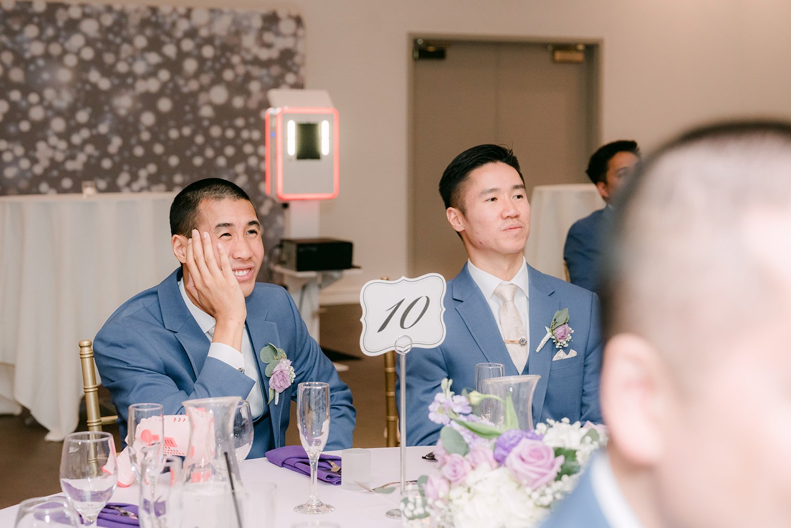 Michael and a guest laughing at the head table.