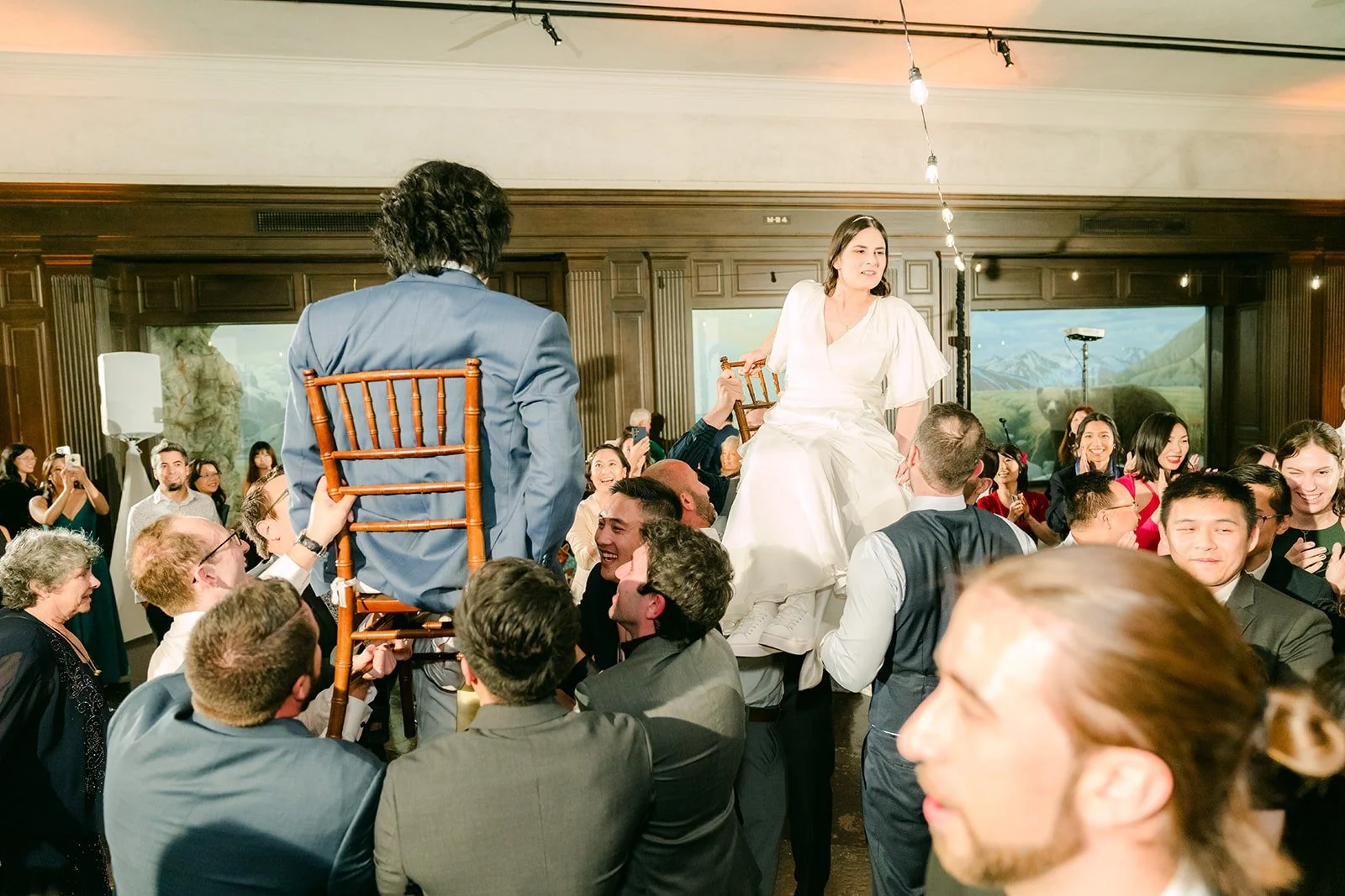 A chair rising above the crowd during the Hora