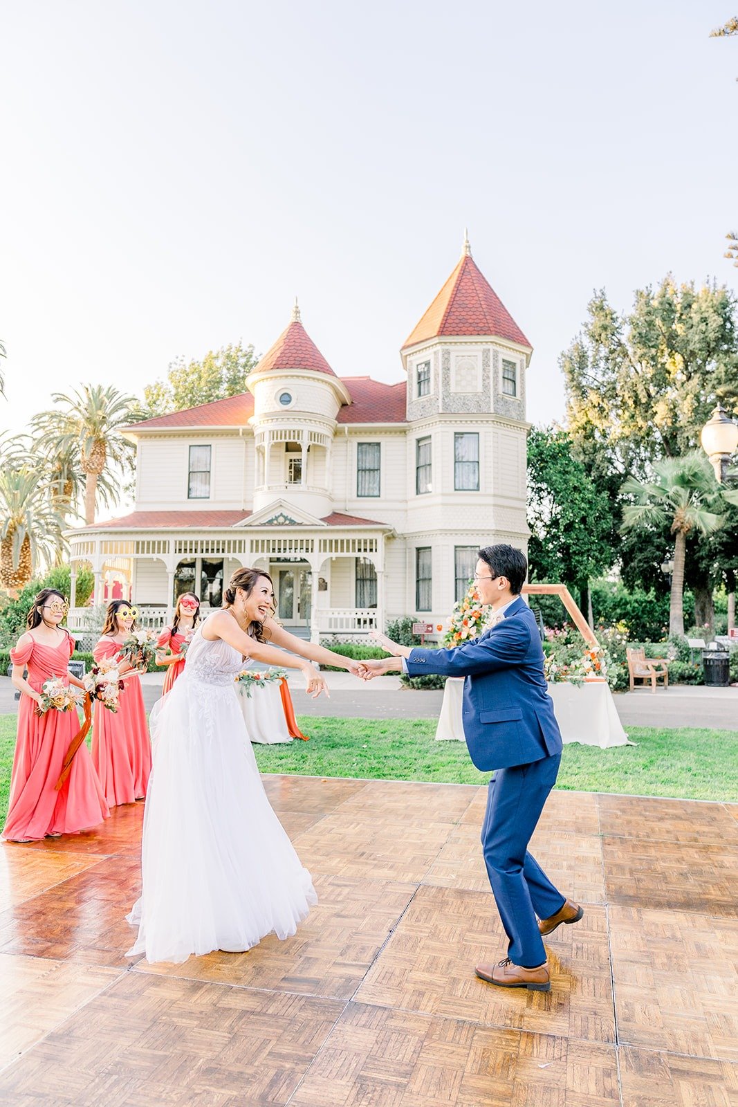 Ariel and Alex starting their choreographed first dance in front of the ranch house