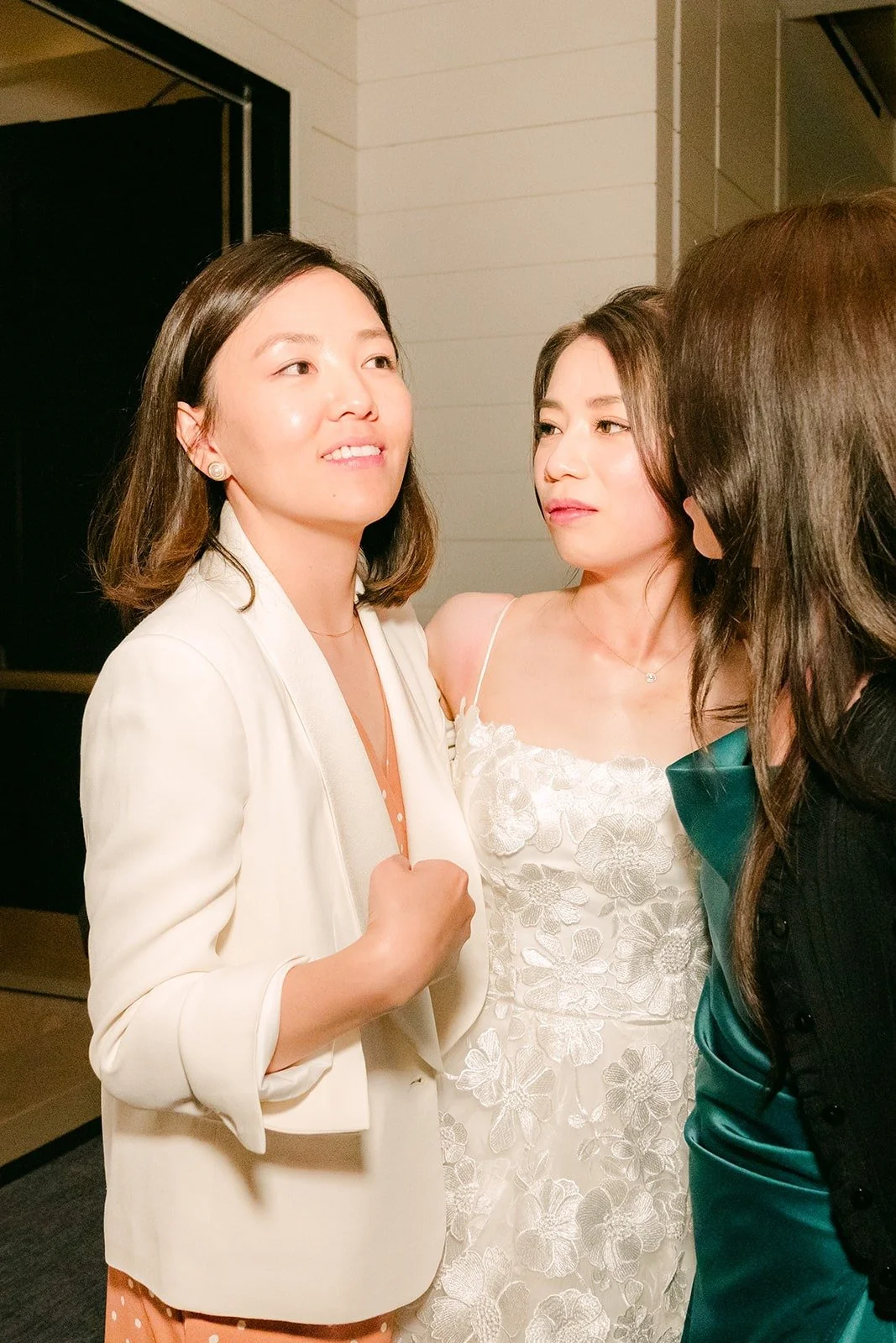 Friends laughing together with Angela on the dance floor