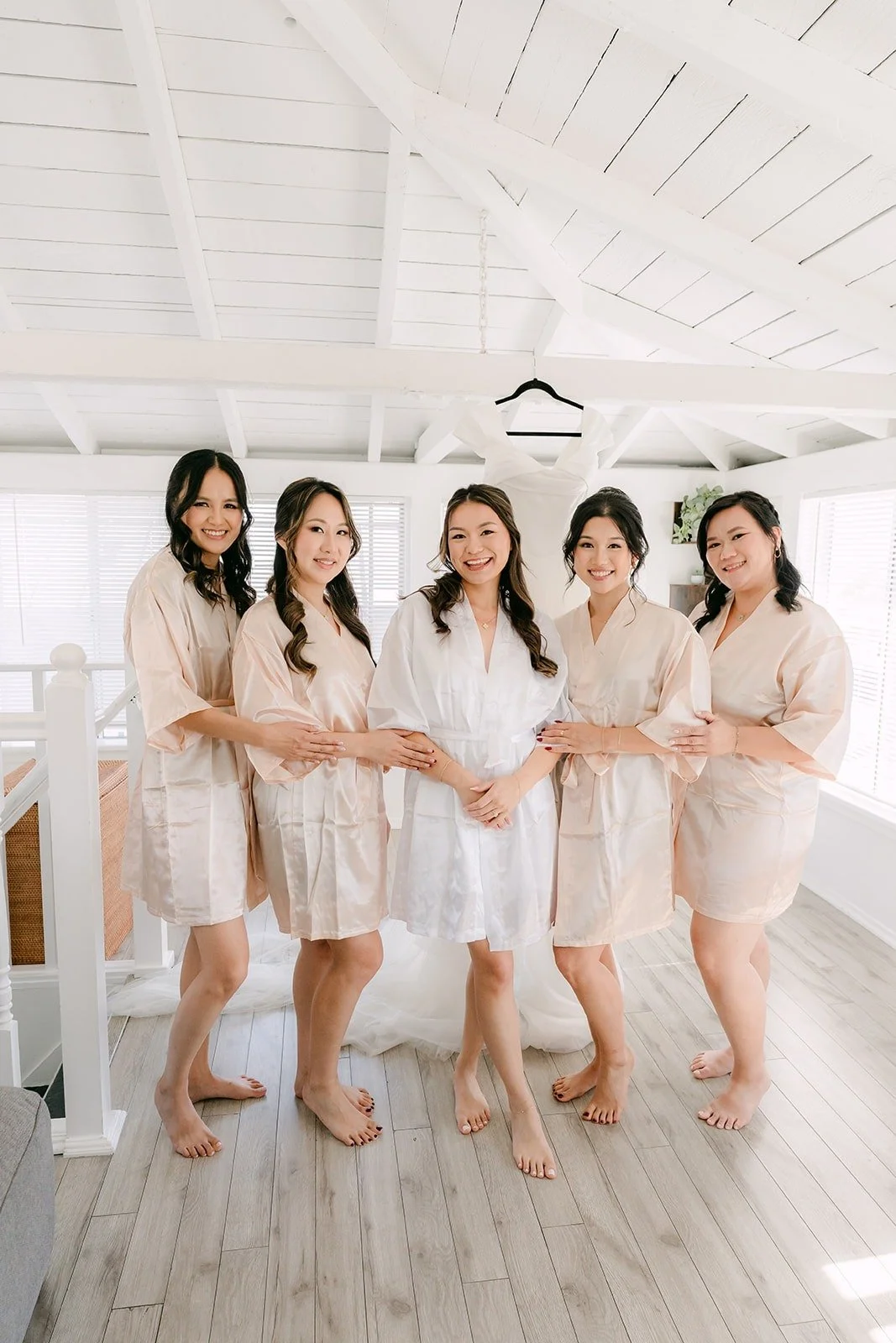 Jadee and her bridesmaids in matching robes