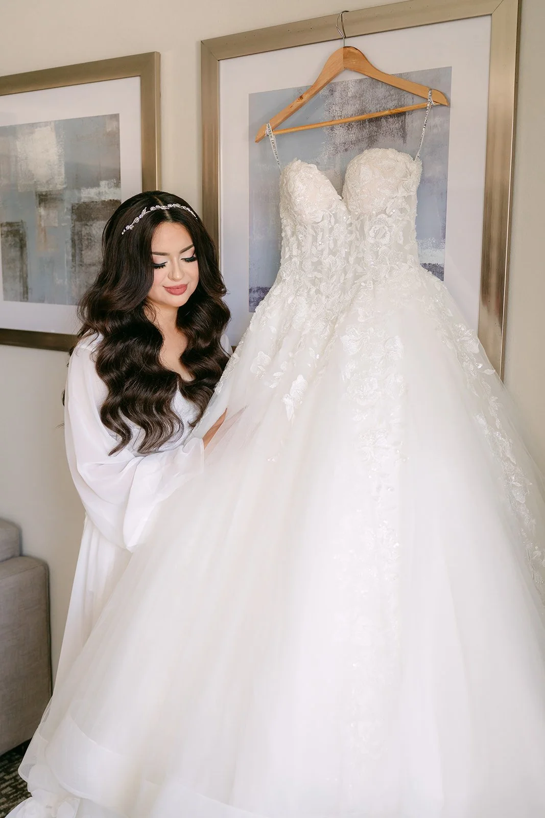 Sandra with her ball gown hanging in the getting ready suite.