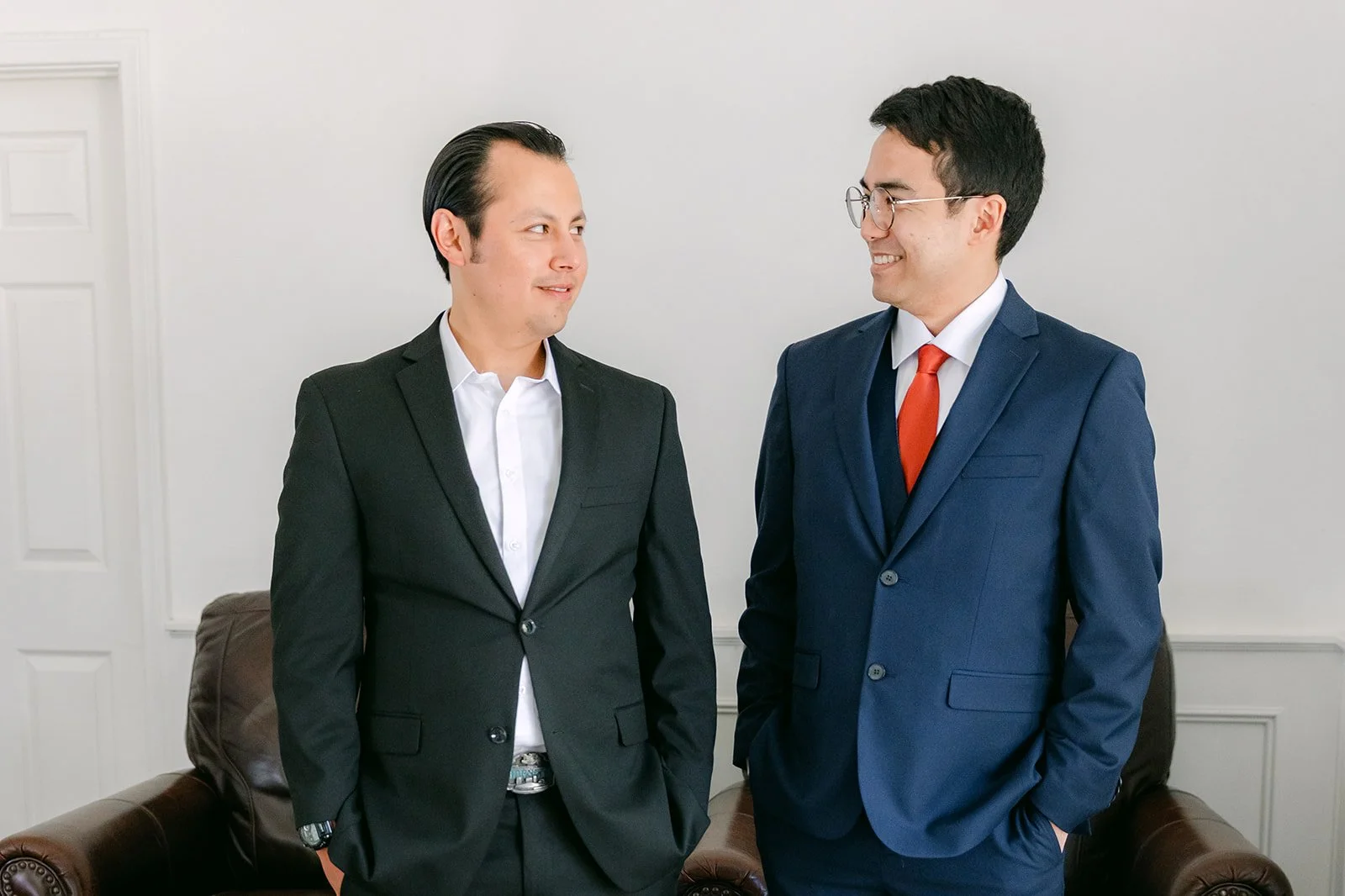 Jonathan and his best man laughing in the groom's suite
