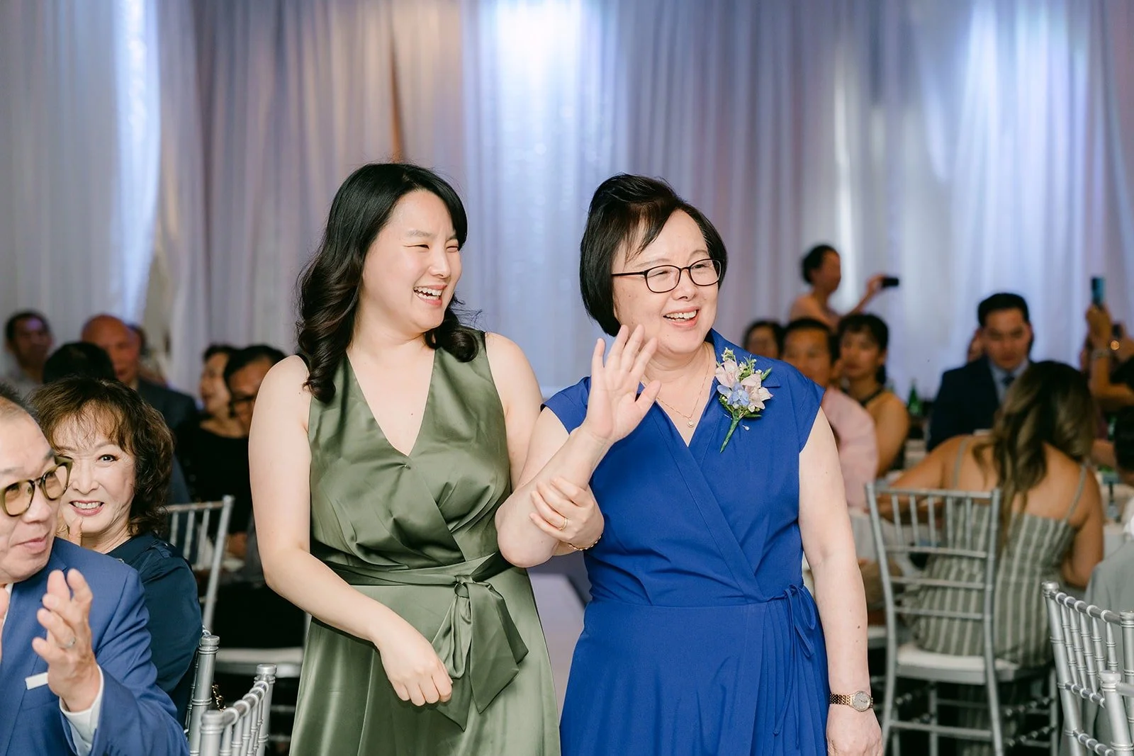 Two family members dancing in for the grand entrance