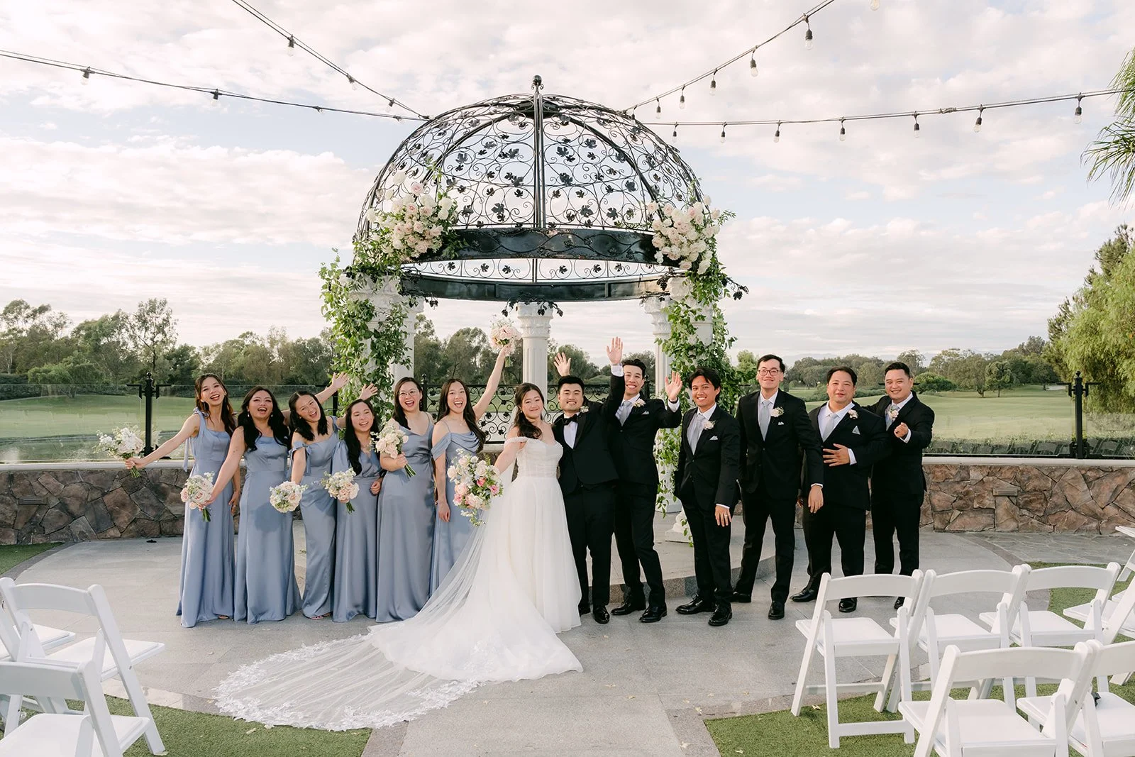 The full wedding party at the gazebo