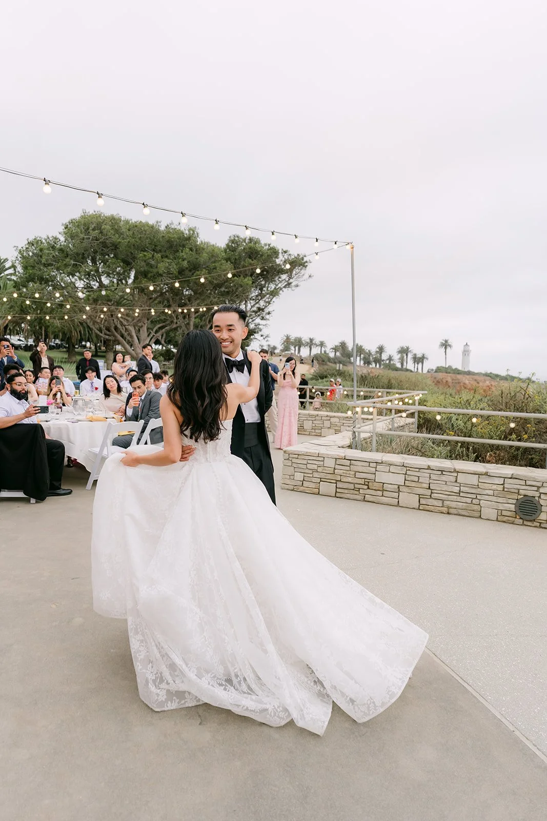 Kim's gown swirling as Vincent spins her