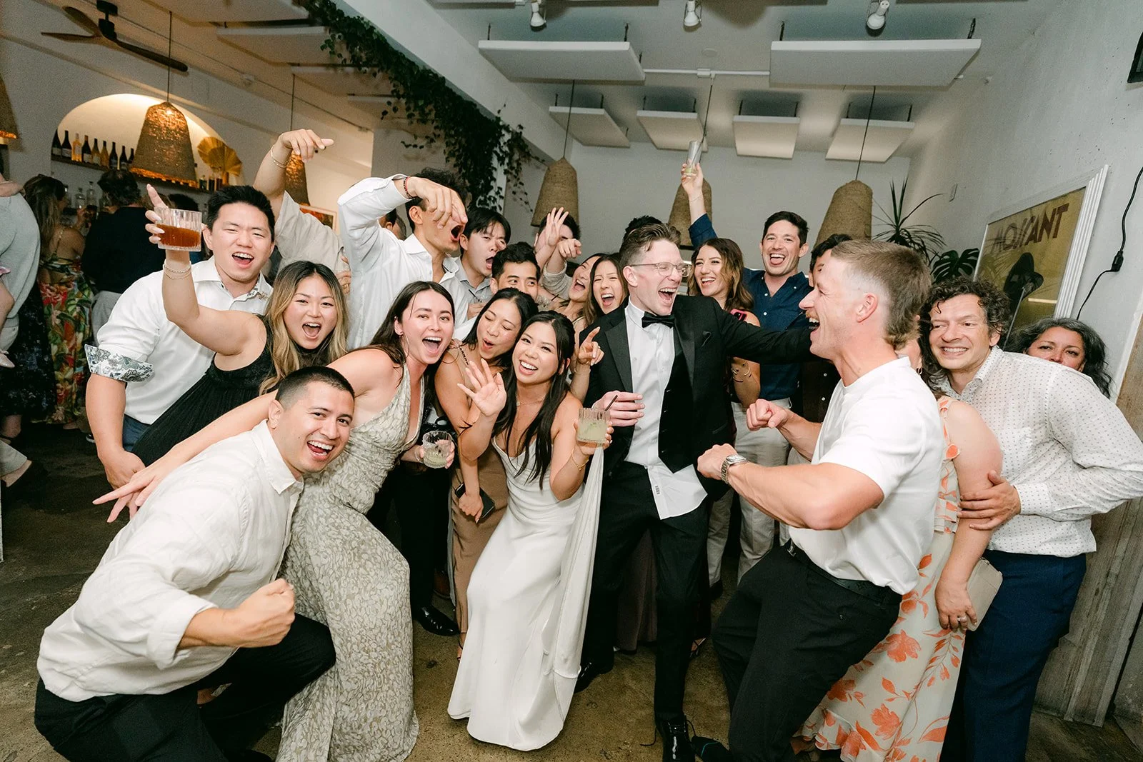 A late night group photo on the dance floor