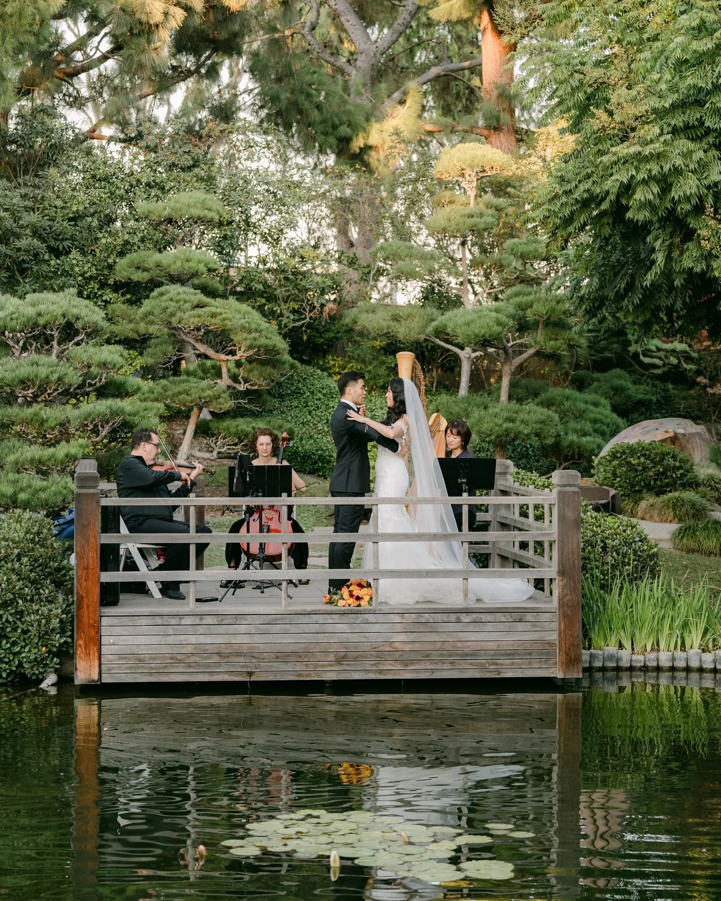 Feels like a dream in this hidden gem garden inspired J&amp;J &lsquo;s wedding @csulbjapanesegarden with their playful koi and layering garden scenery. 
.
Photo @oneandonlyproduction 
Makeup @jenn_thai 
Floral @habibixflake 
Officiant @angec24 
Gown 