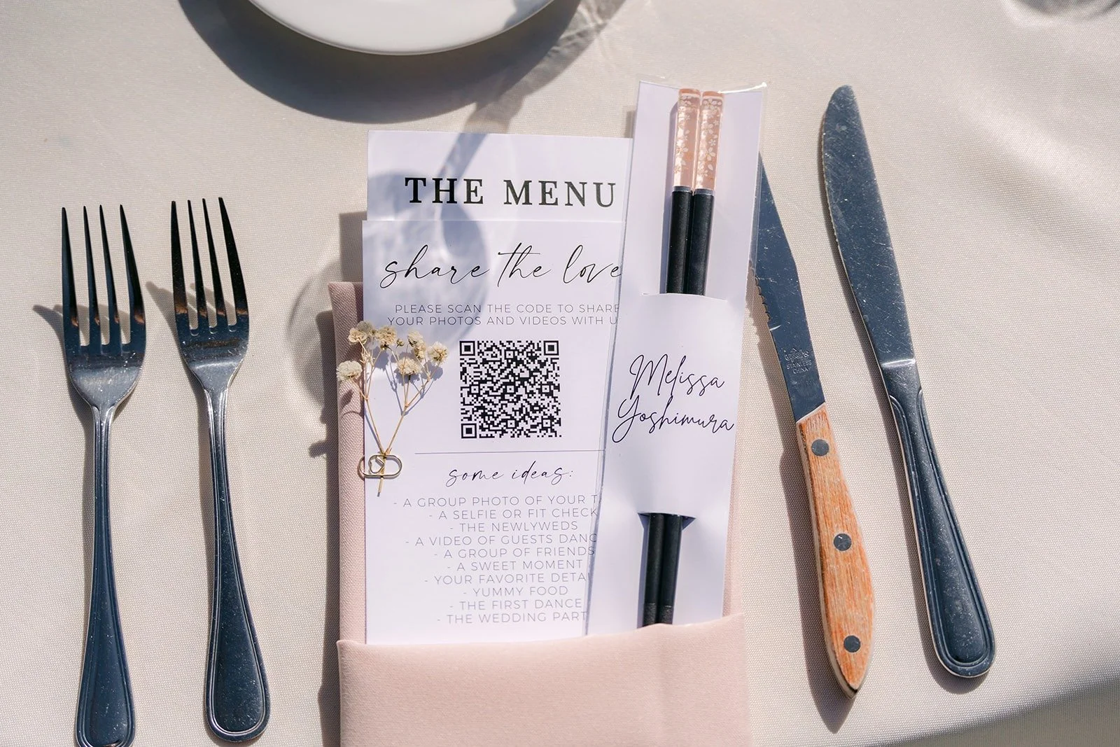 A place setting with the menu card and folded napkin