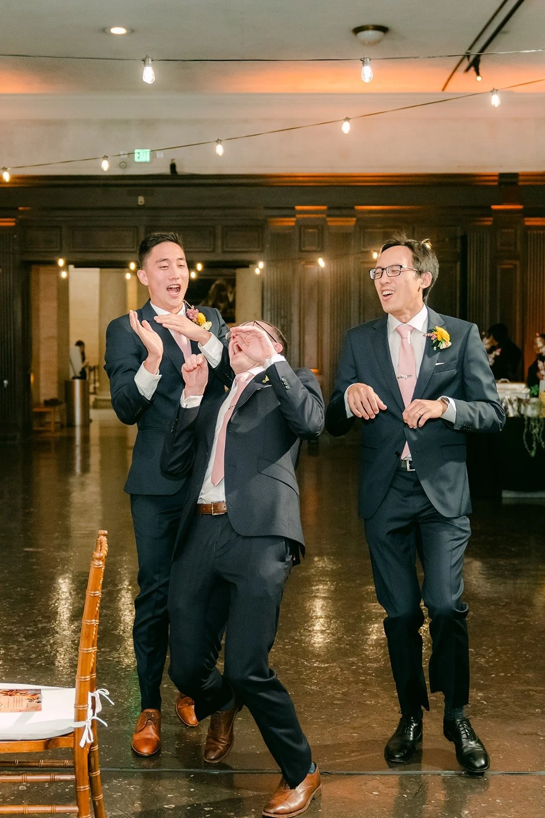 Groomsmen dancing in for the grand entrance