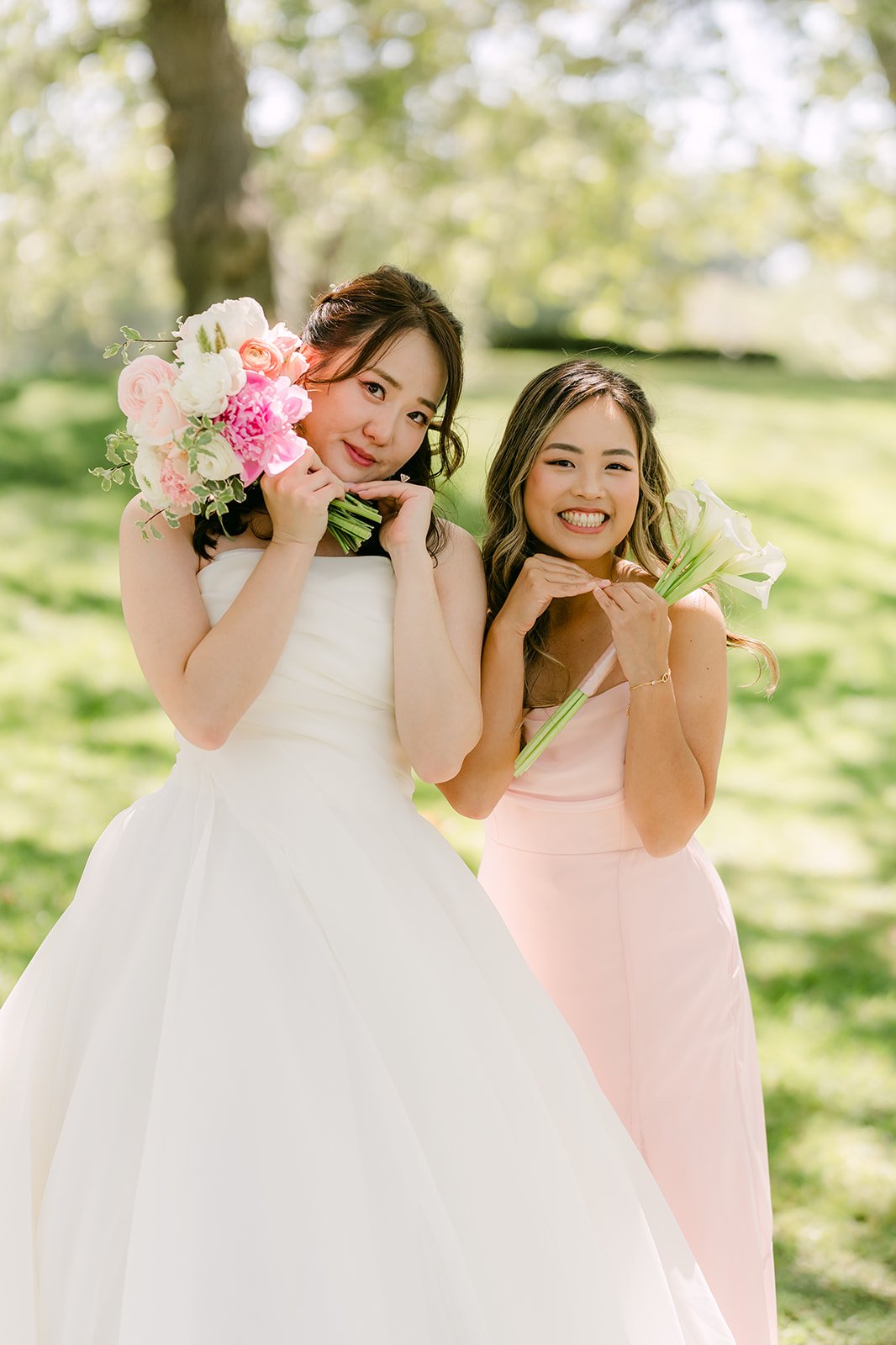 Judy laughing with a bridesmaid