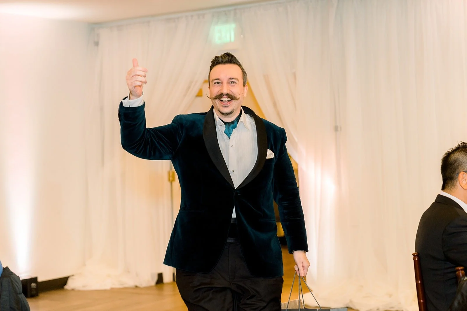 The magic show performer greeting the reception
