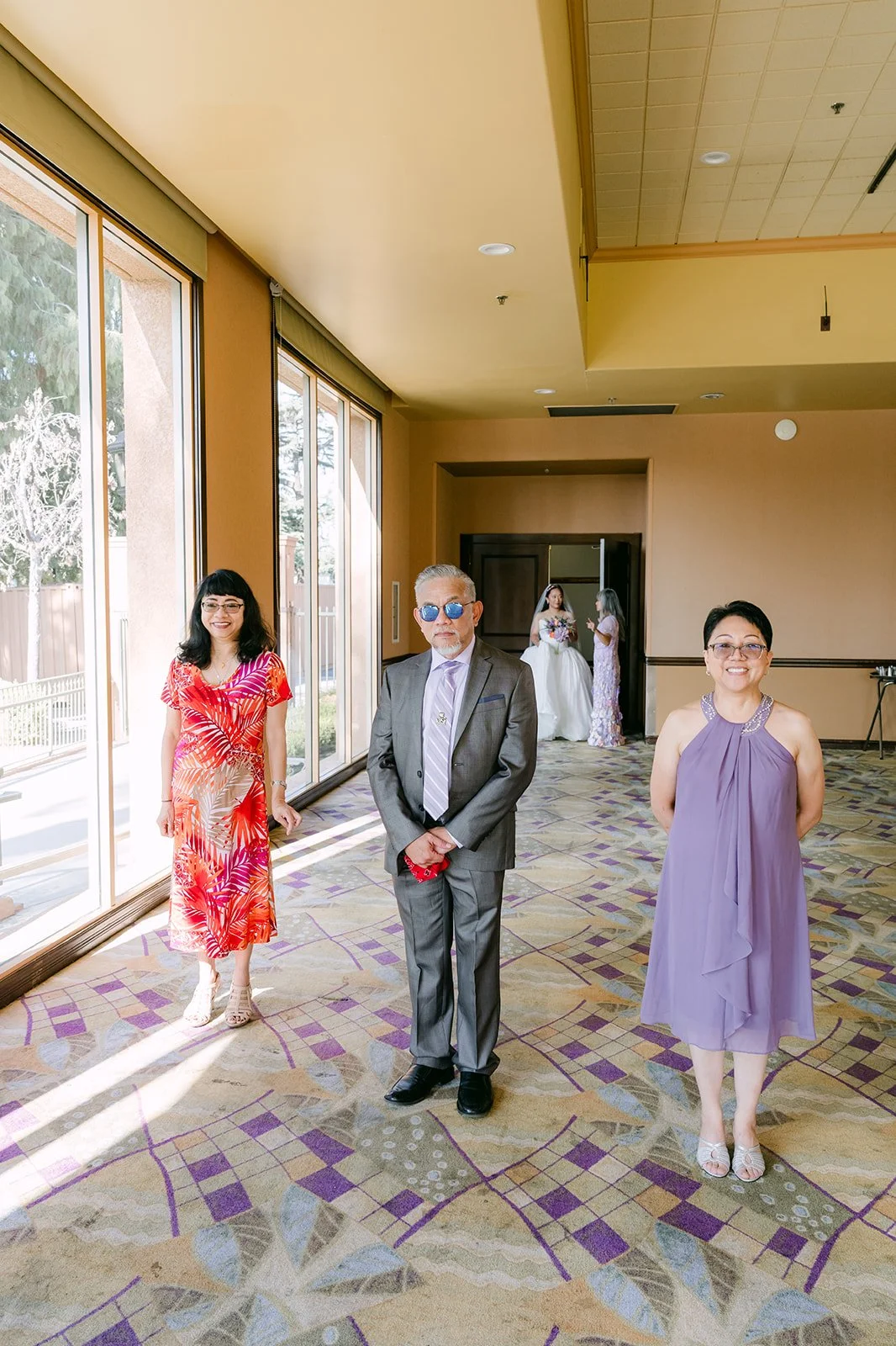 Angela's godparents waiting for the first look