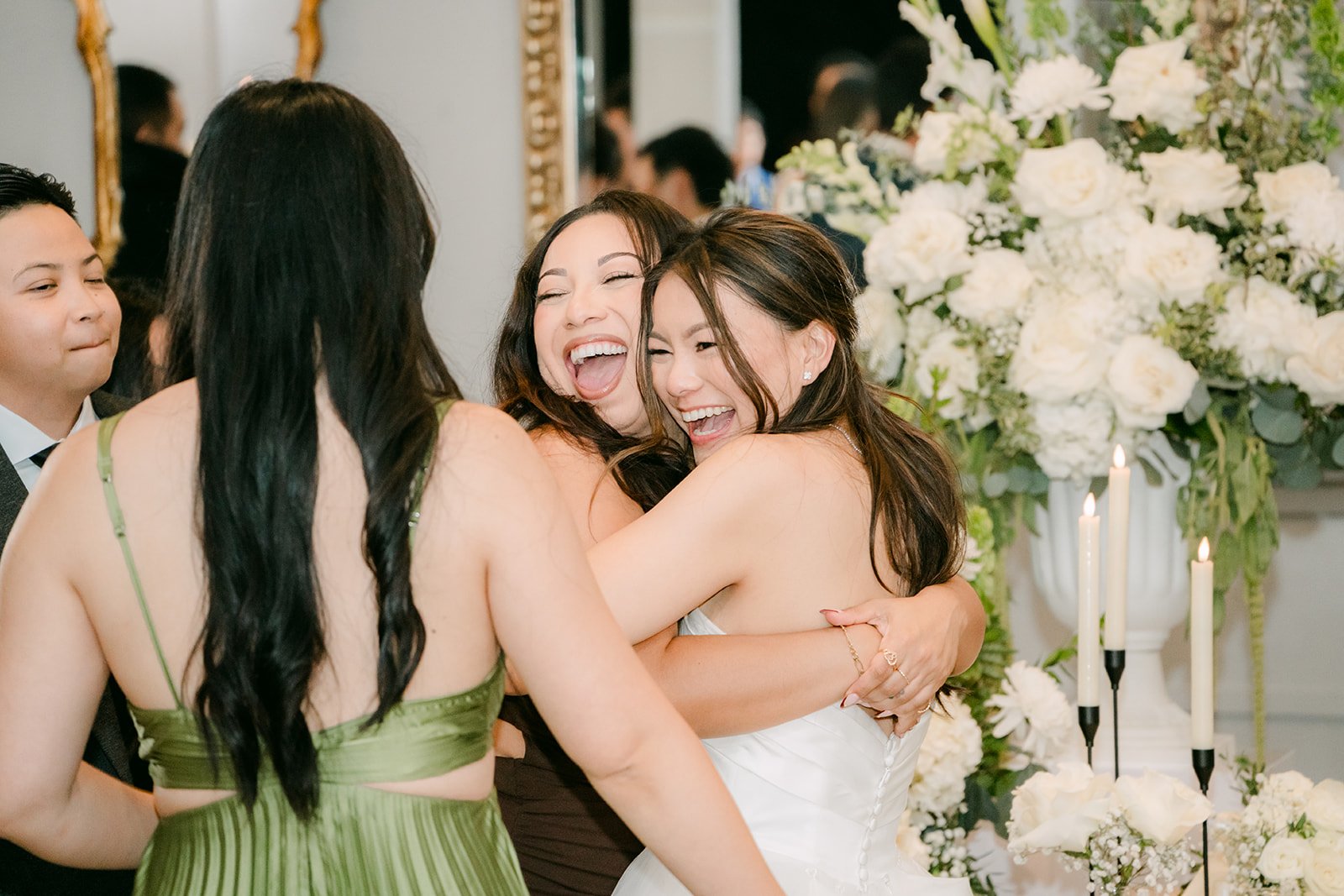 Jadee hugging friends during table visits