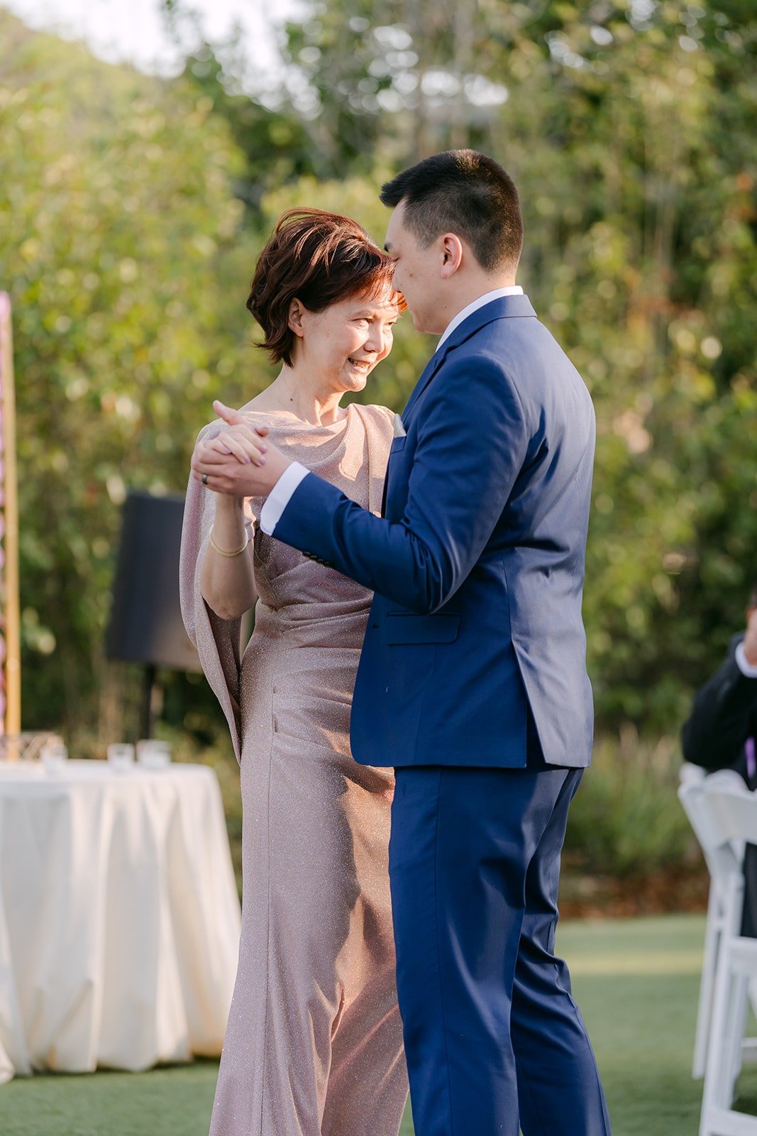 Alex dancing with his mom at the reception