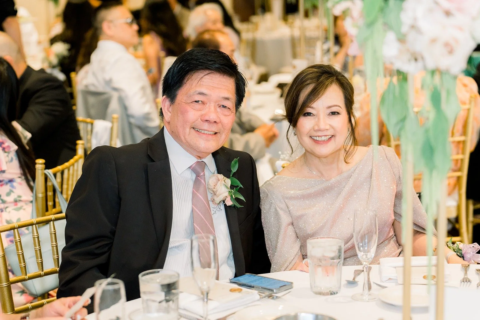 Family members smiling during the speeches