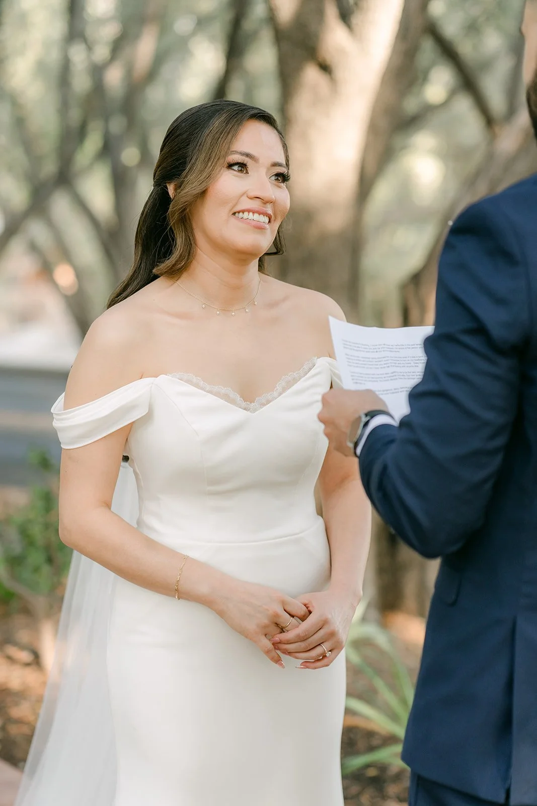 Mariana smiling as Danny reads her a letter