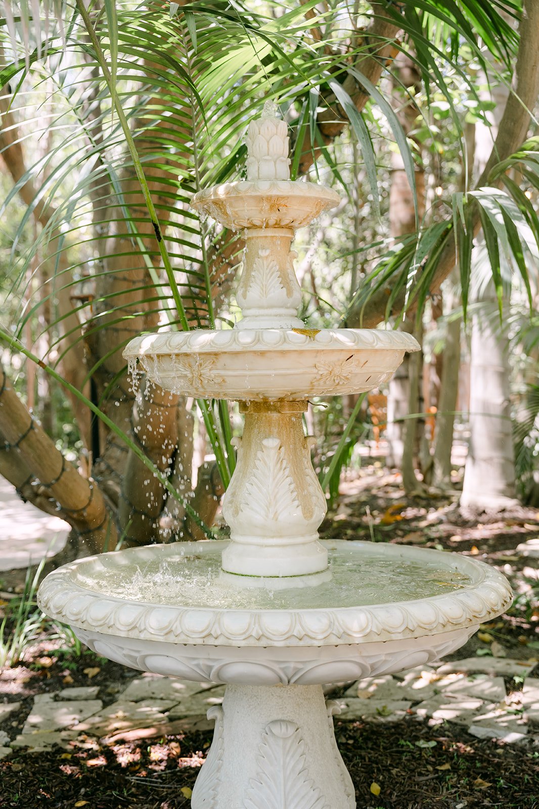 The white tiered fountain at the Eden Gardens ceremony site.
