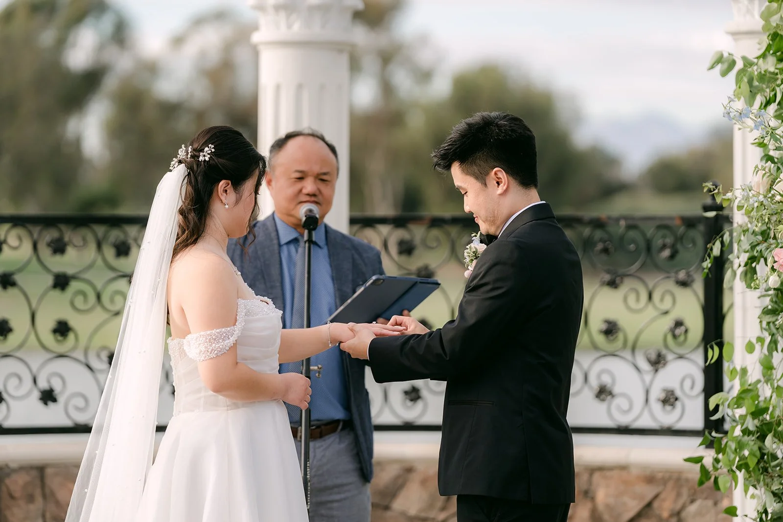 Jessica and Kenny exchanging rings