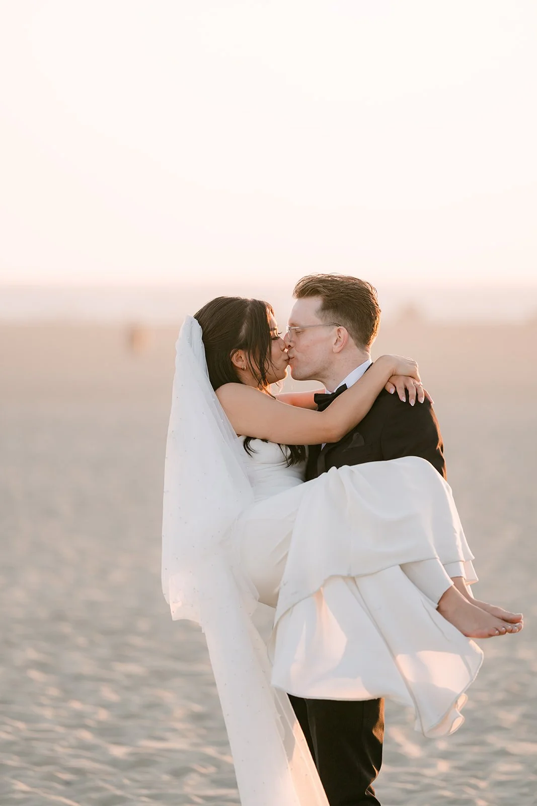 A spinning kiss on the sand