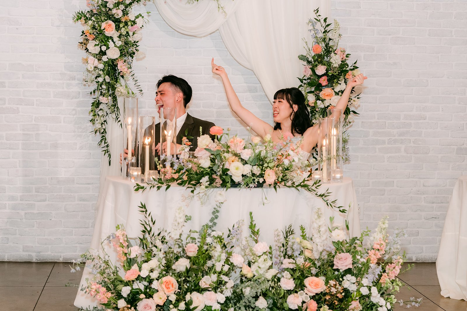 Vivian cheering at the sweetheart table