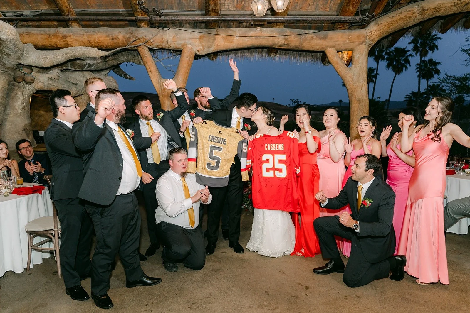 The wedding party in football jerseys for the jersey swap group photo