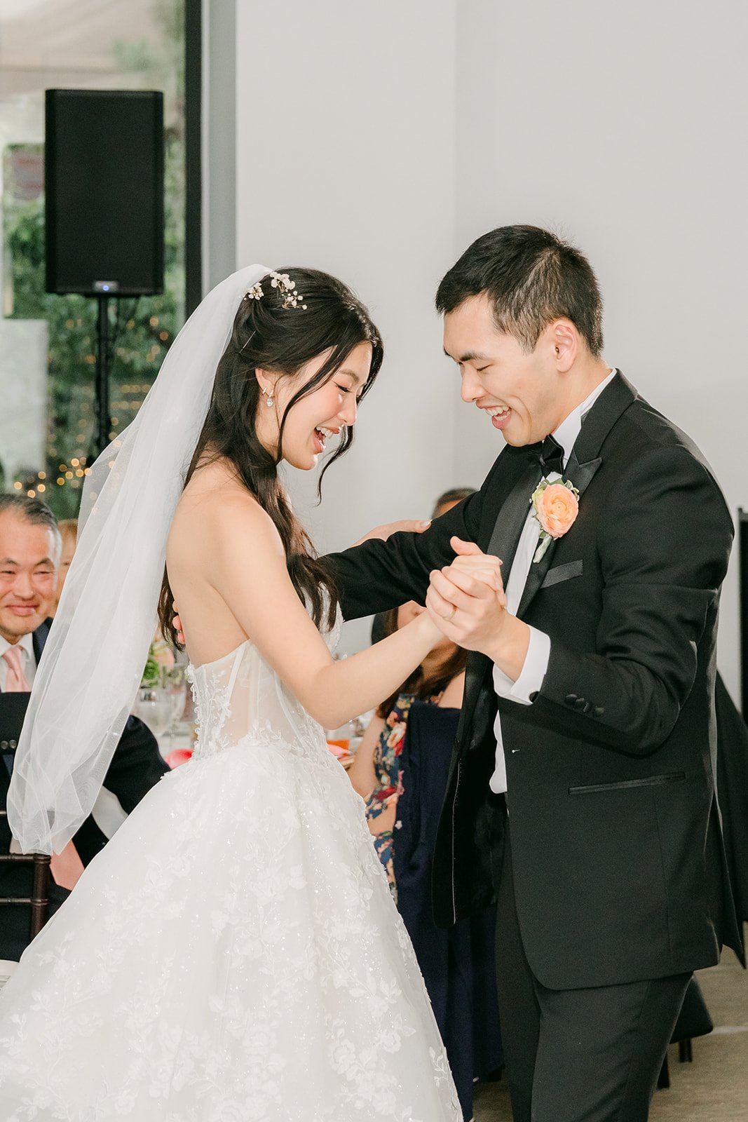 Clarissa and Austin dancing under the ballroom lights