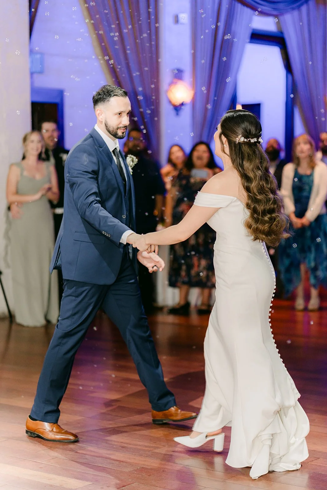 Danny twirling Mariana during their first dance