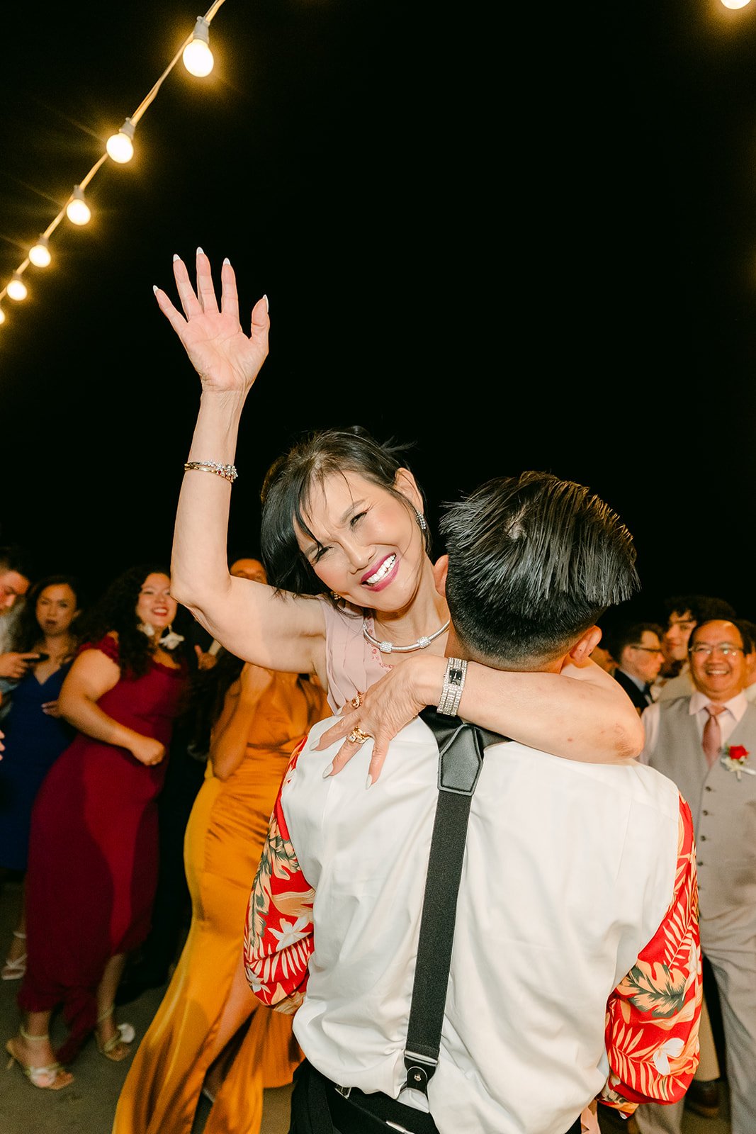 Friends celebrating on the dance floor