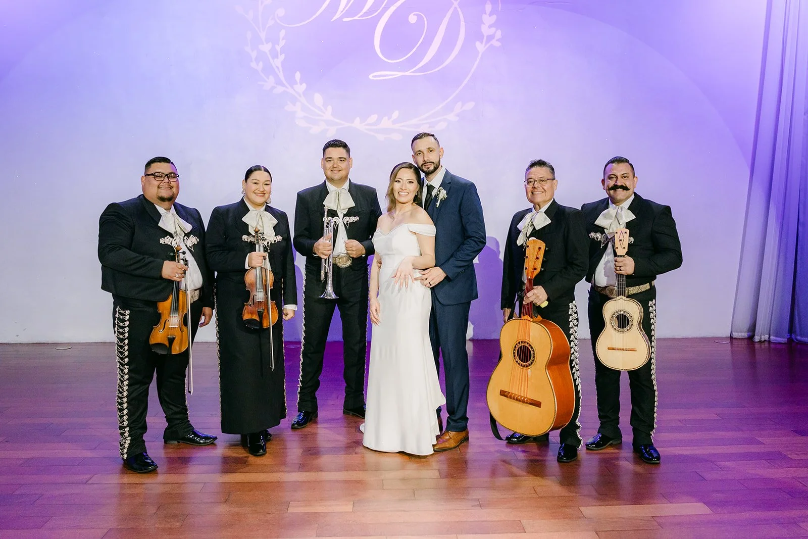 Mariachi Antiguo de México on stage with the newlyweds