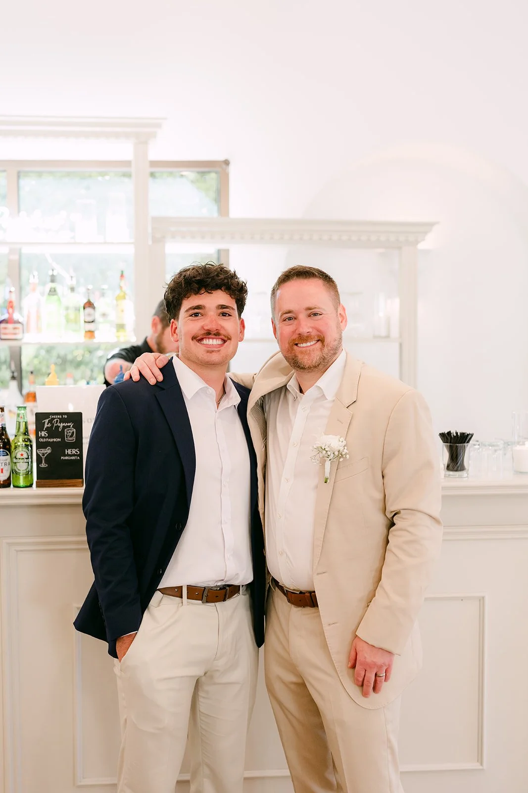 Two guests posing together in the Lounge
