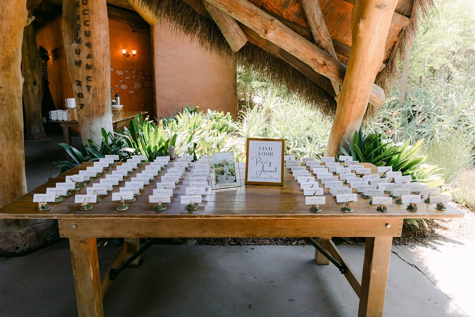 The escort card table under the pavilion at Kijamii Overlook