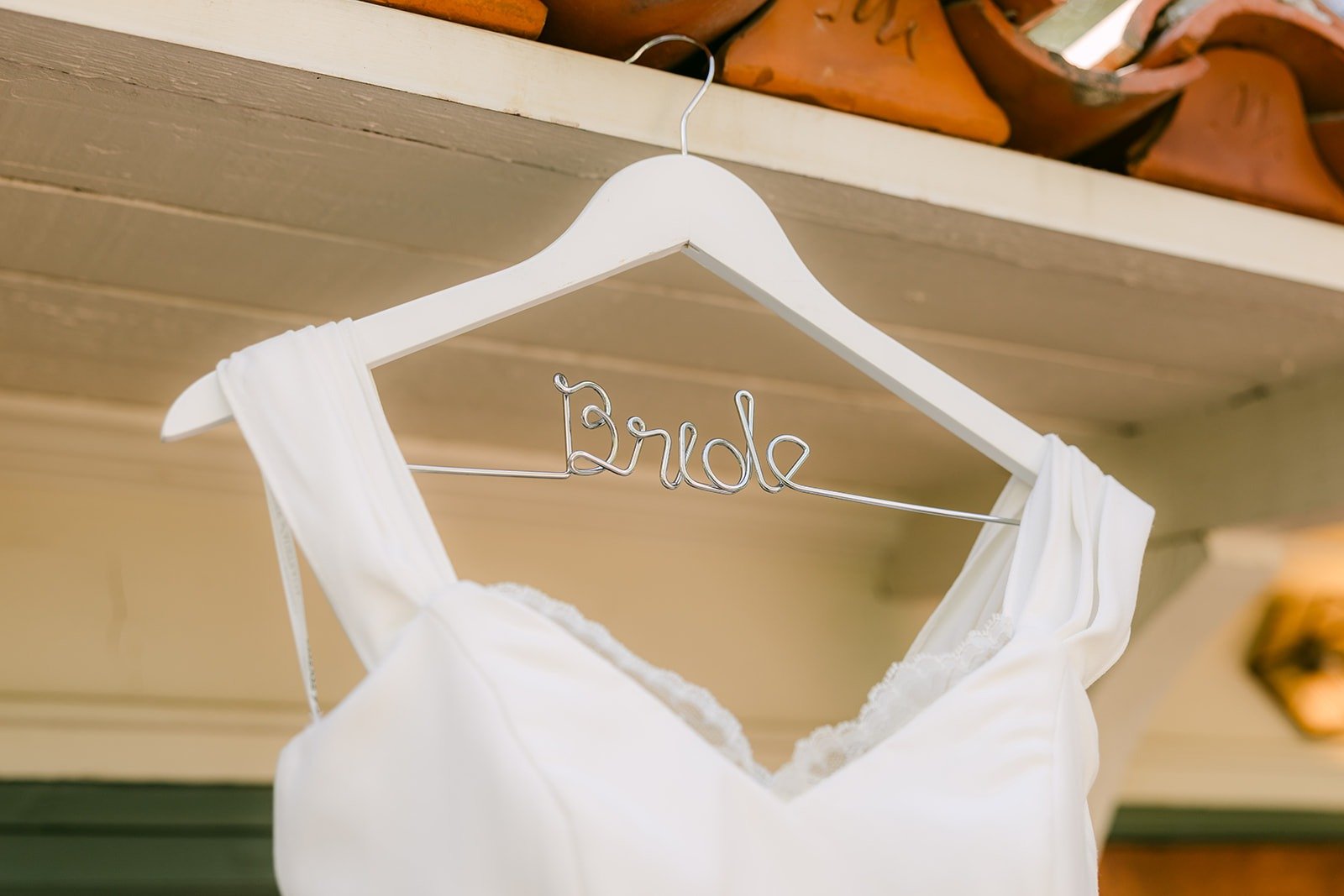 Mariana's wedding gown on a personalized Bride hanger