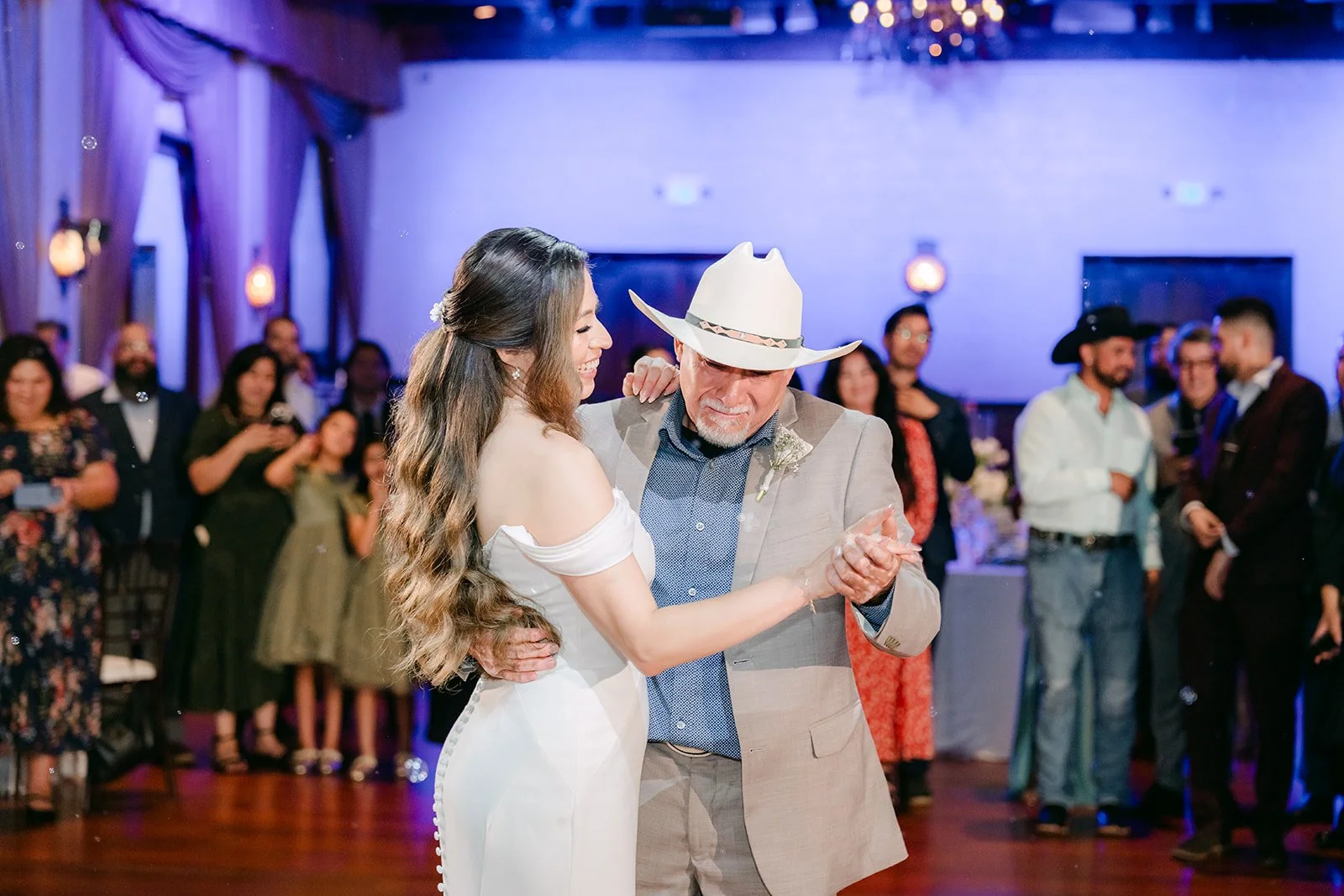 Mariana dancing with her dad