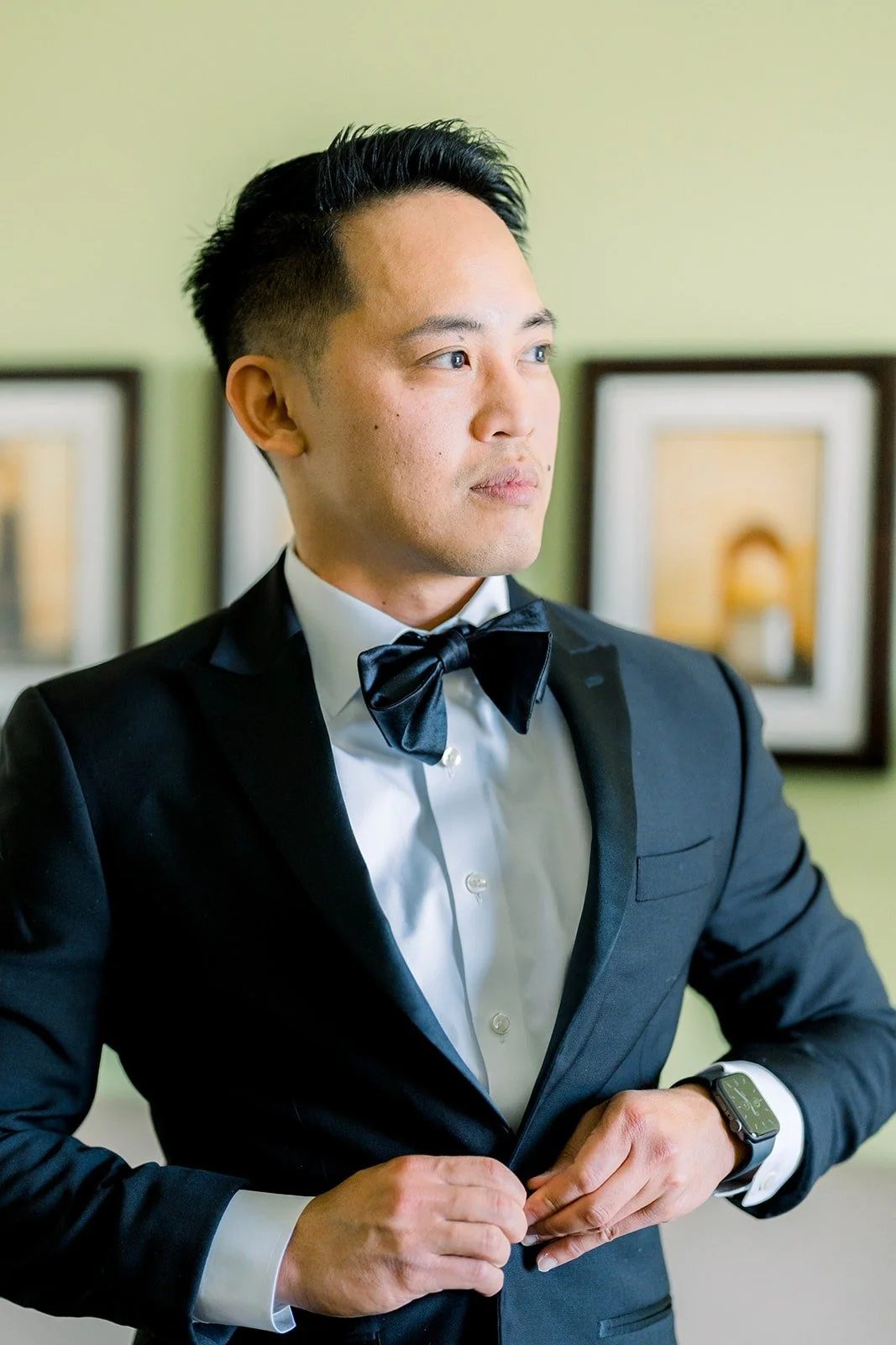 Ralph adjusting his bow tie